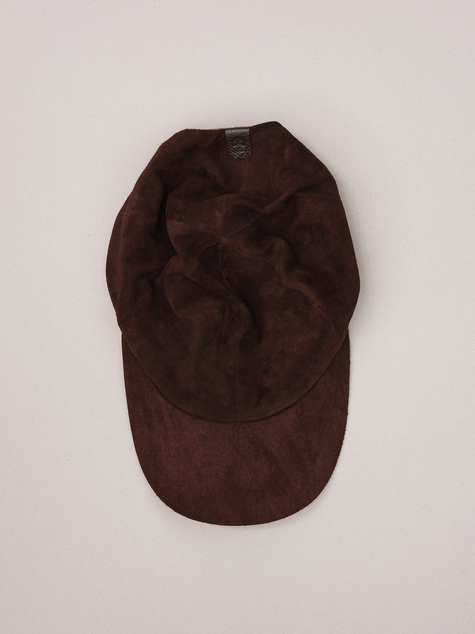 Handmade brown suede baseball cap.