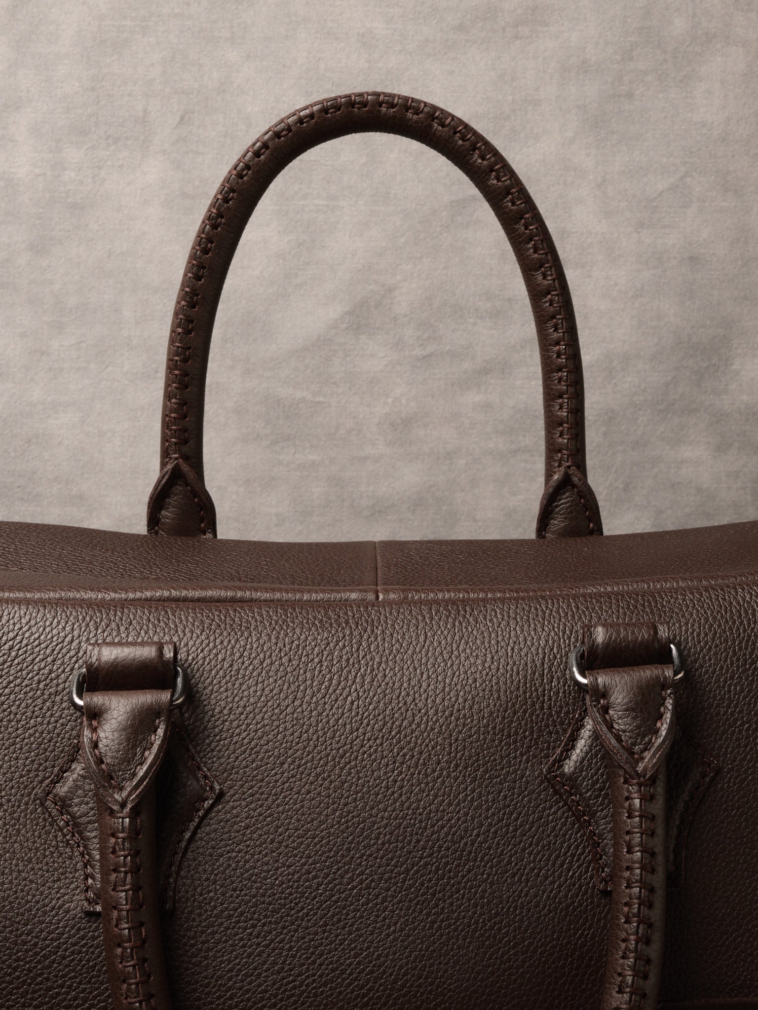 Signature Hand-stitched Handles. Weekend Bag Dark Brown by Capra Leather
