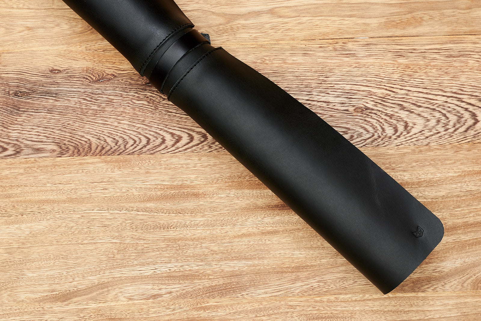 Handcrafted leather desk mat with a minimalist touch.