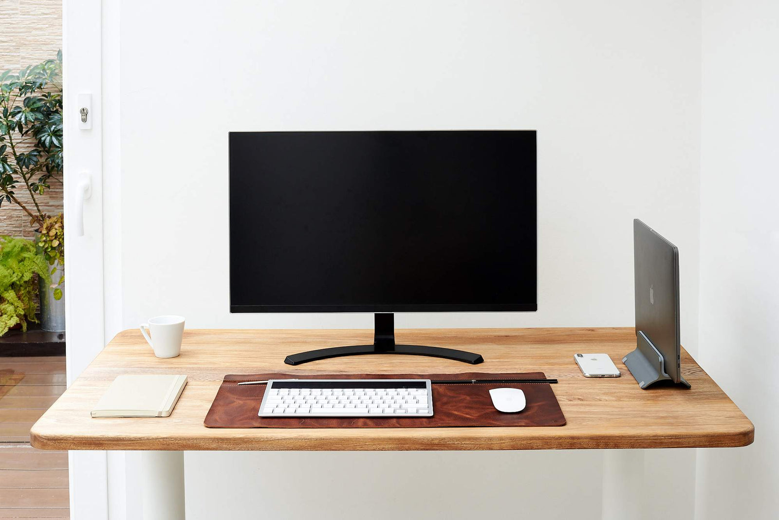 Minimalist leather desk pad for an elegant workspace.