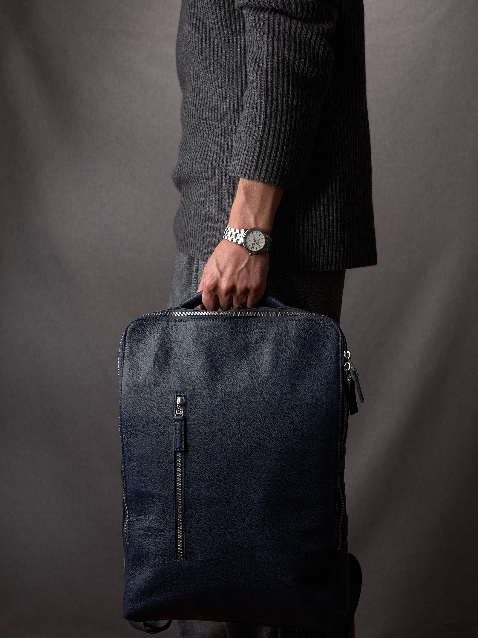 Suede and leather backpack made for men. Soft finish in leather. Comfortable top handle with soft feeling. Leather accessories for men. Premium materials. Made in leather by Capra Leather.