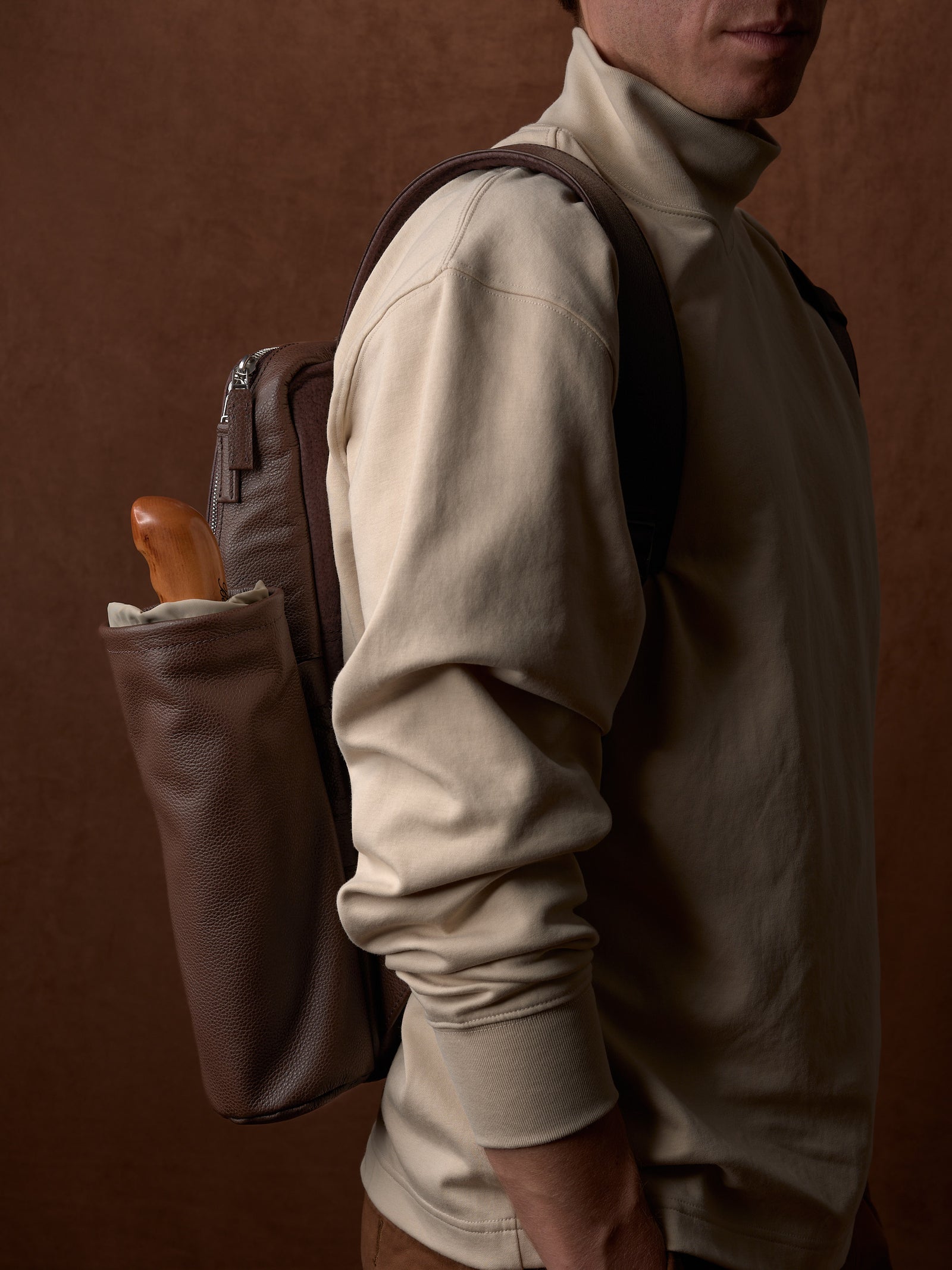 Men's style. Men's fashion. Leather and suede accessories for men. Tech backpack. Water bottle/umbrella detachable pouch. Backpack for everyday work. Leather and suede for comfort and durability. Made by Capra Leather.