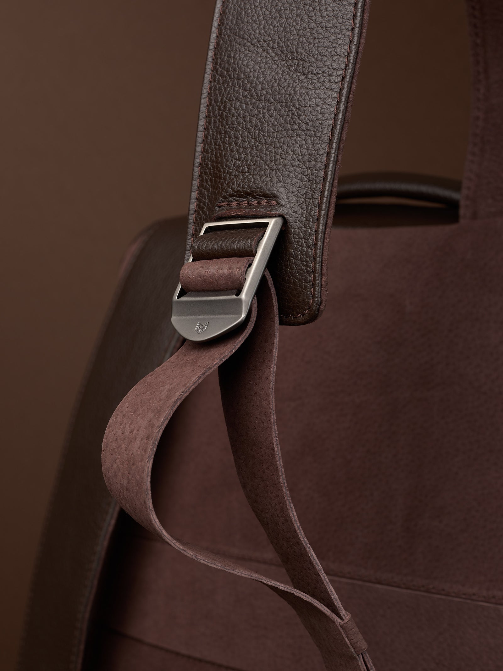 Hidden pocket in the back for easy access. Soft finish made in suede and leather. Premium materials. Double D Ring system for quick adjustments. Men's backpack for style and durability. Made in quality materials by Capra Leather.