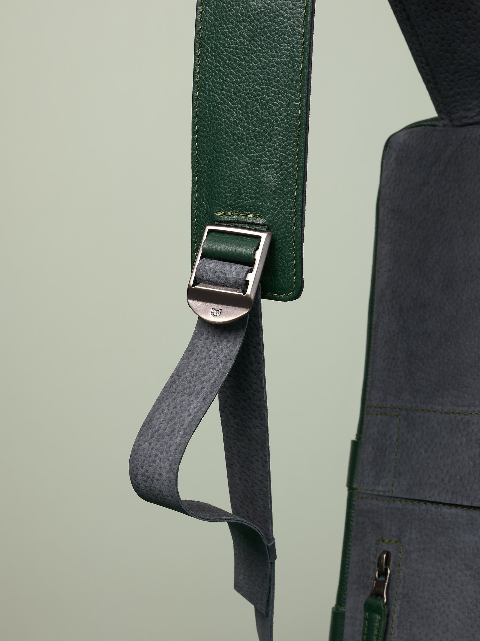 Hidden pocket in the back for easy access. Soft finish made in suede and leather. Premium materials. Double D Ring system for quick adjustments. Men's backpack for style and durability. Made in quality materials by Capra Leather.