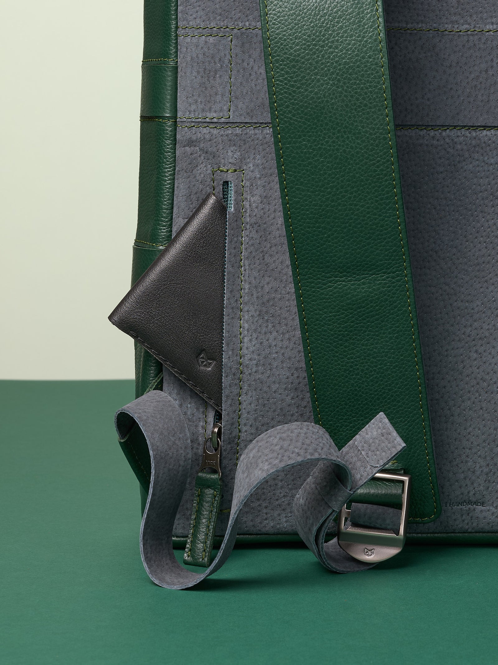 Hidden pocket in the back for easy access. Soft finish made in suede and leather. Premium materials. Double D Ring system for quick adjustments. Men's backpack for style and durability. Made in quality materials by Capra Leather.