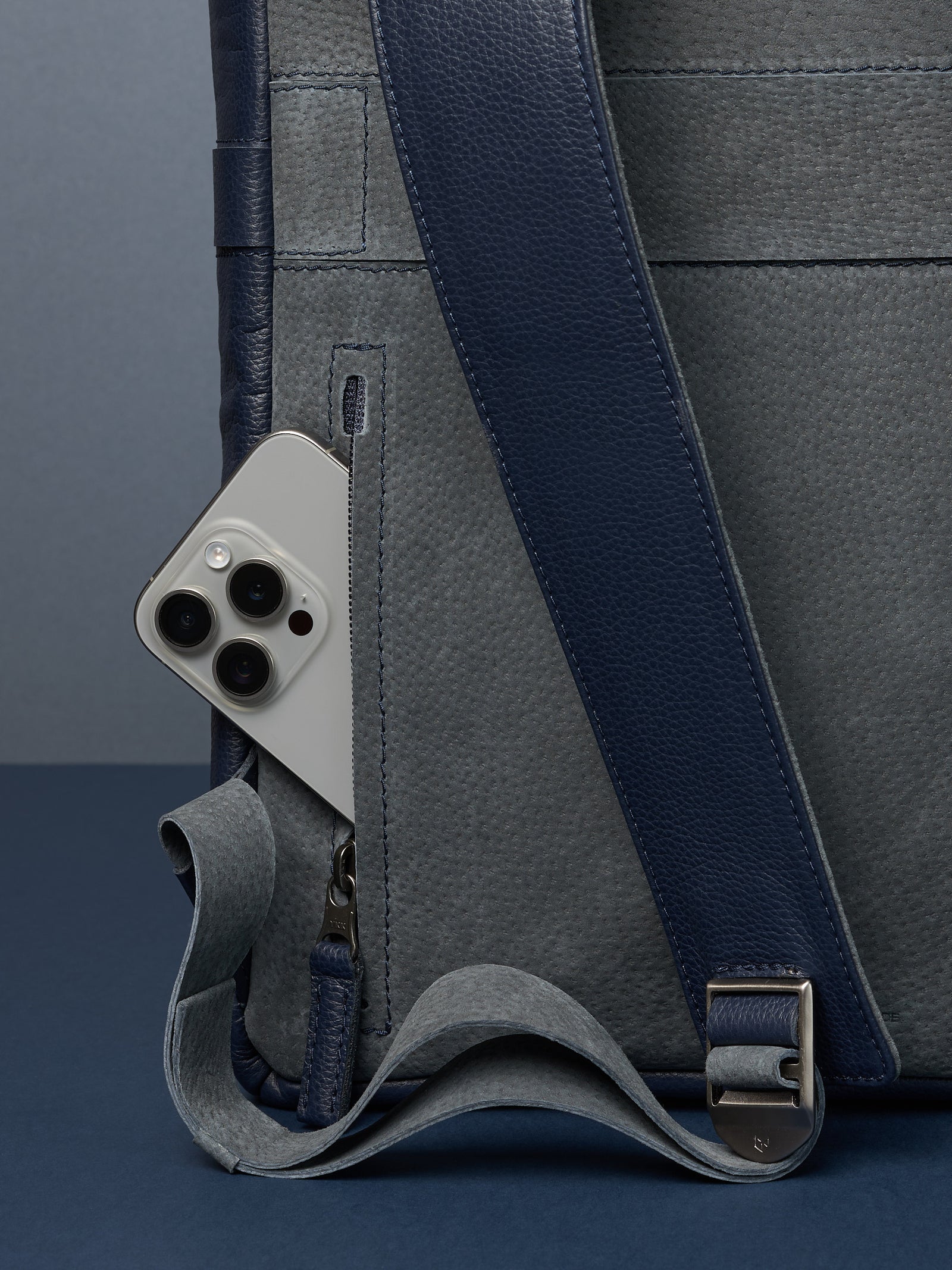 Hidden pocket in the back for easy access. Soft finish made in suede and leather. Premium materials. Double D Ring system for quick adjustments. Men's backpack for style and durability. Made in quality materials by Capra Leather.