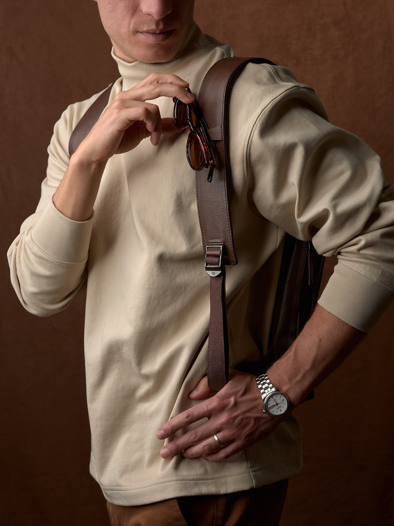 Men's fashion. Men's accessories. Men's style. Sunglasses holder in strap. Double D.Ring system for quick adjustments. Padded shoulder straps for comfort. Memory foam padded backpack. Leather bag for everyday made in premium leather by Capra Leather.