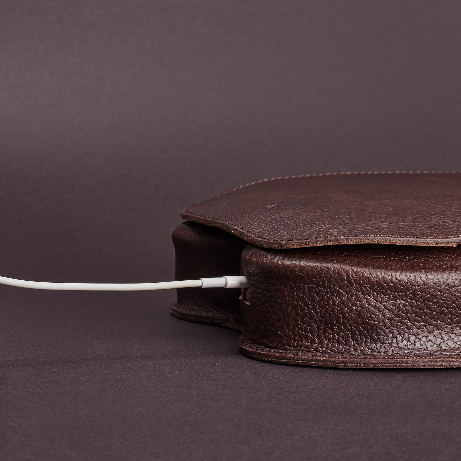 In-case charging cable hole. AirPods Max Case Shield Dark Brown by Capra Leather