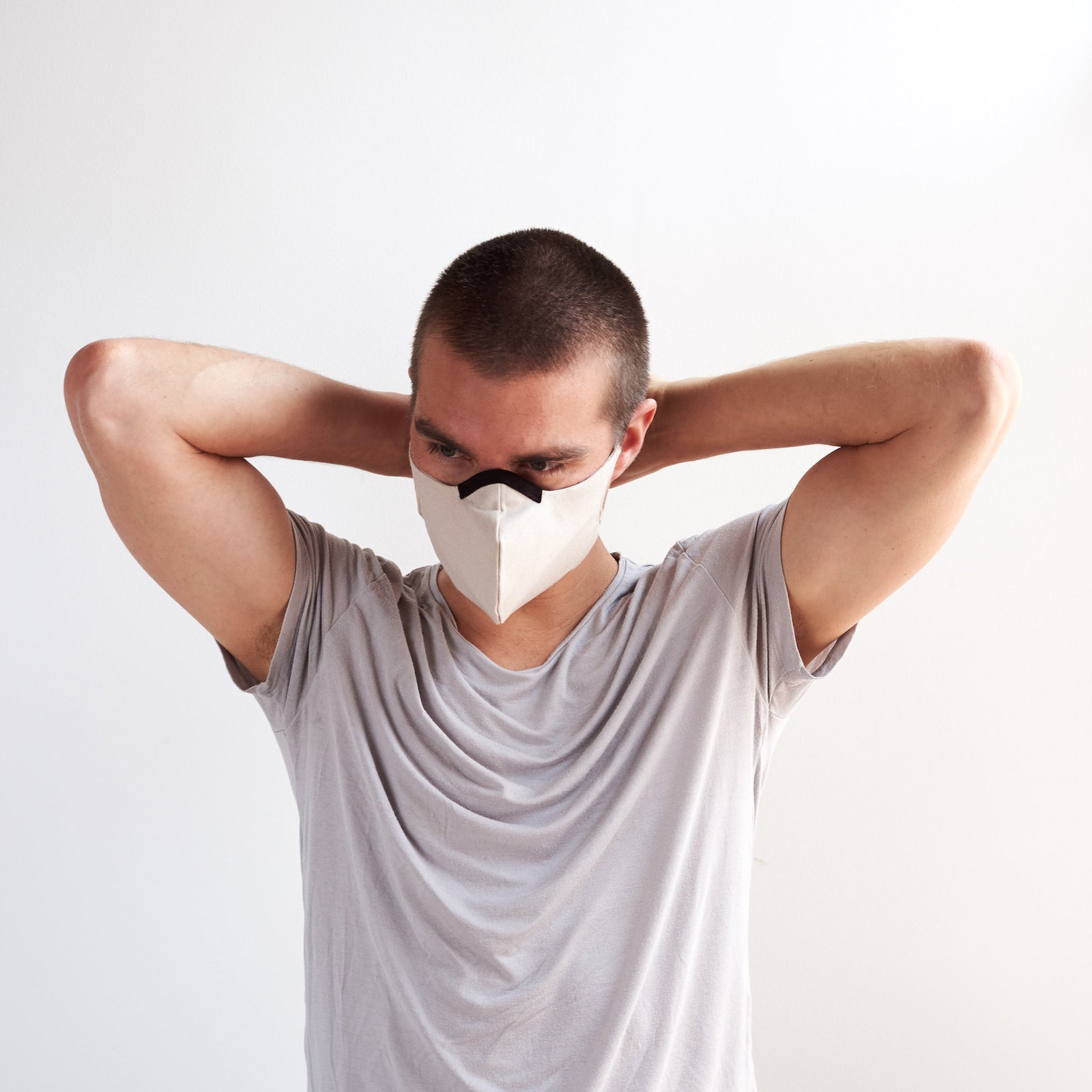 Adjusting view. Light Linen Face Mask by Capra Leather