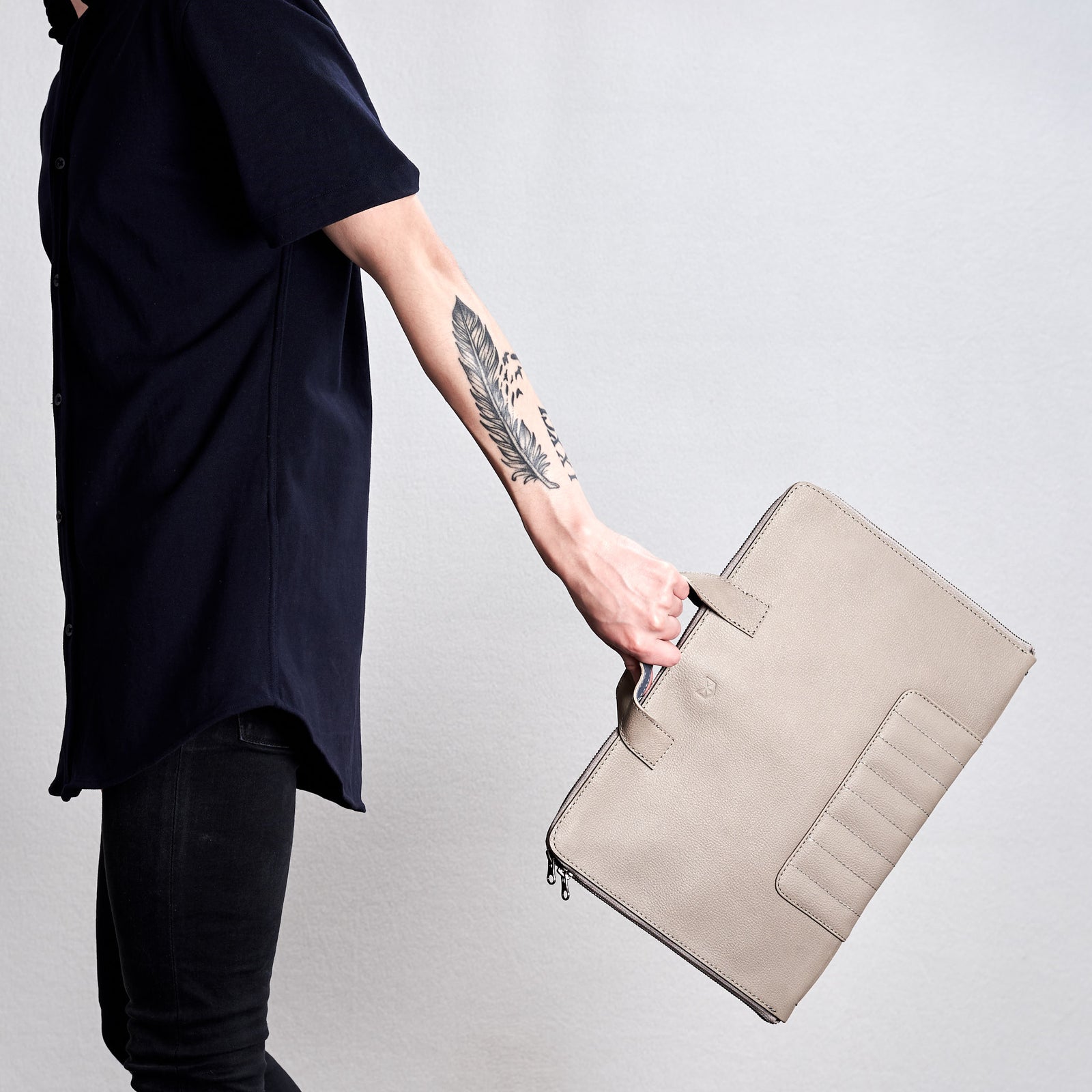 Biker grey portfolio with handles made by Capra Leather.