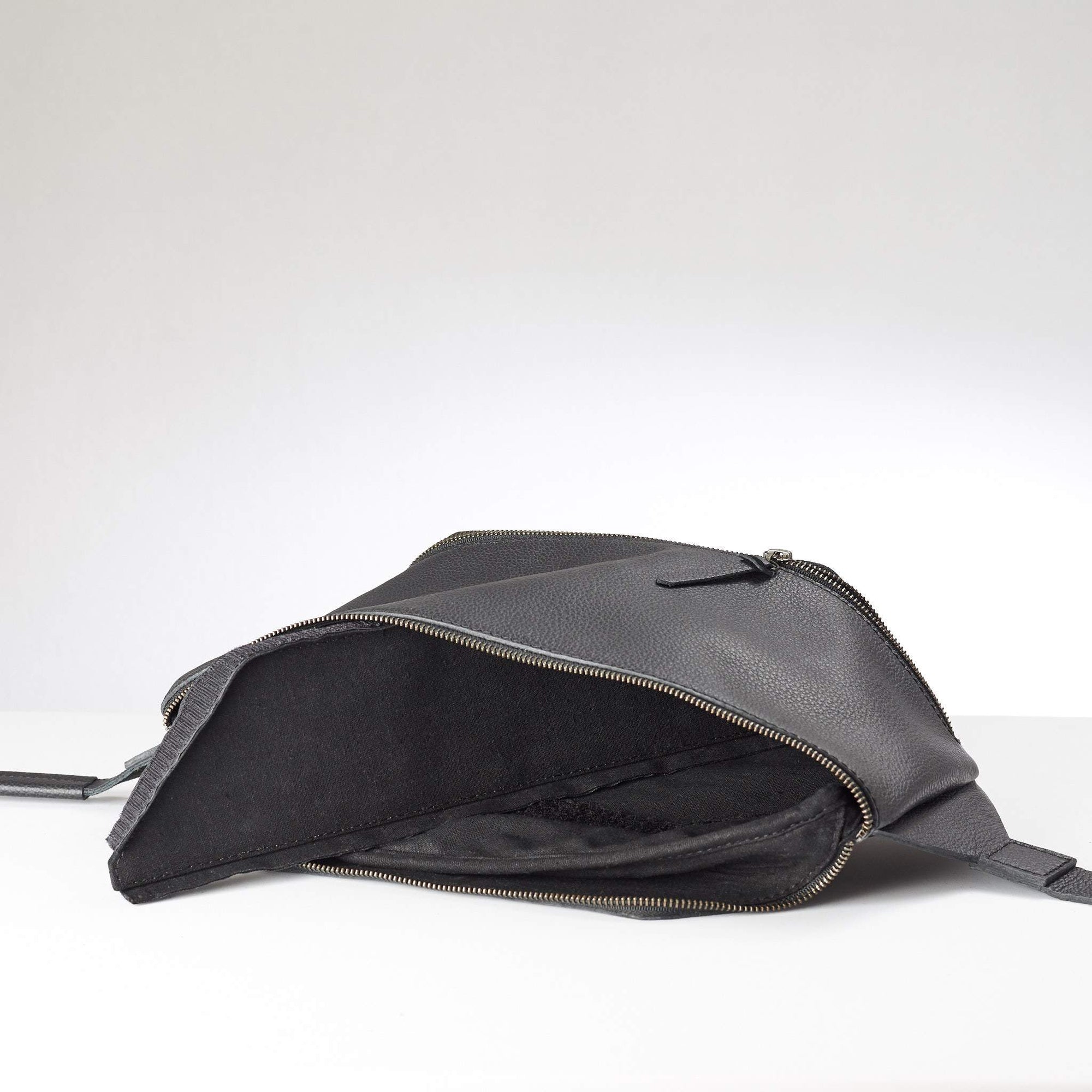 Linen interior. Fenek Sling Bag Black by Capra Leather