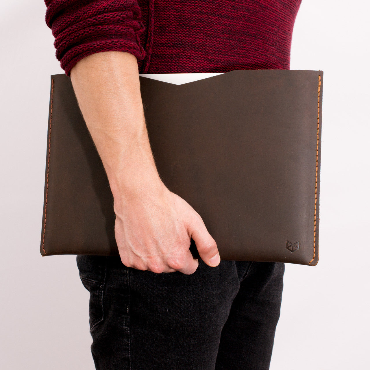 Carrying the macbook pro touch bar with its sleeve