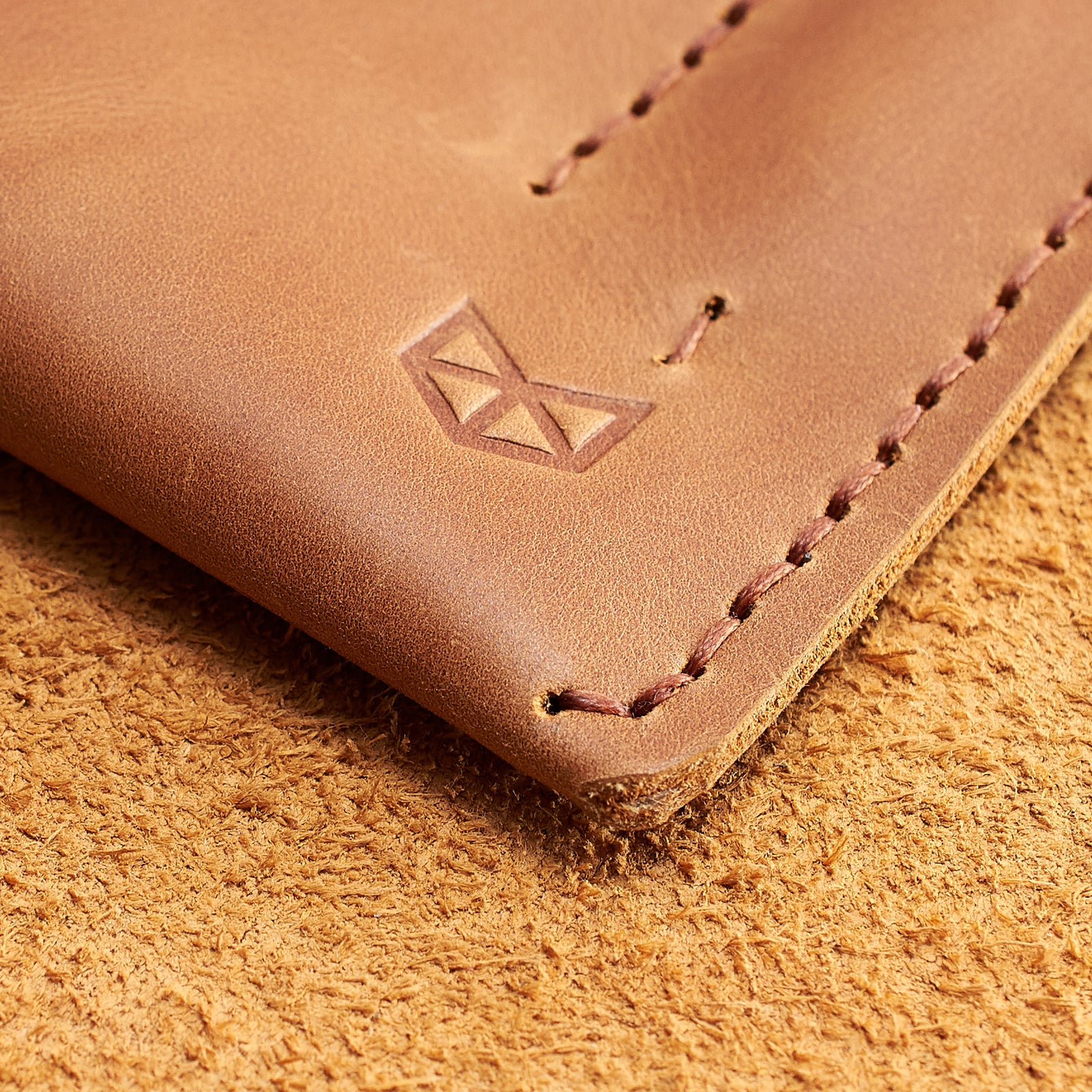 Hand stitch detail. Light brown handcrafted leather reMarkable tablet case. Folio with Marker holder. Paper E-ink tablet minimalist sleeve design.