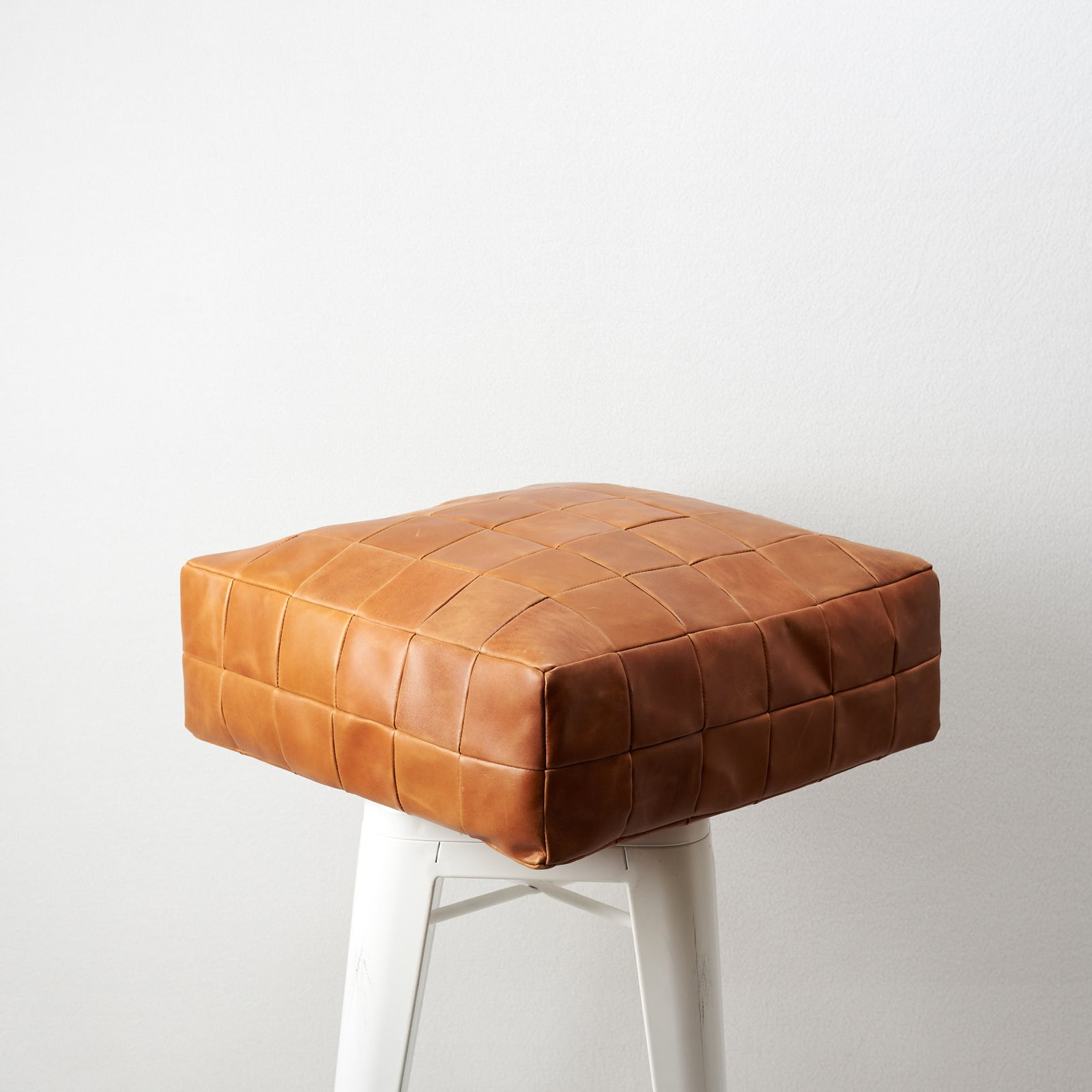 Tan Leather floor cushion pillow for indoors decoration.