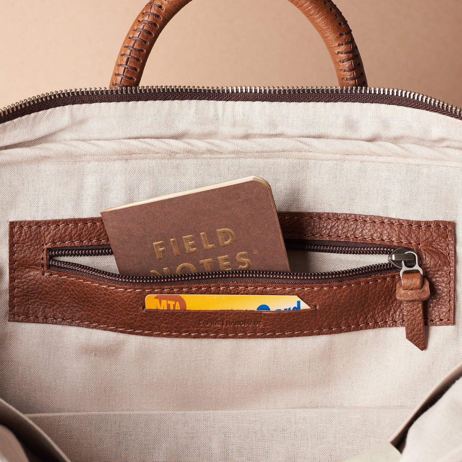 Interior detail for bussiness cards .Tan leather briefcase laptop bag for men. Gazeli laptop briefcase by Capra Leather.