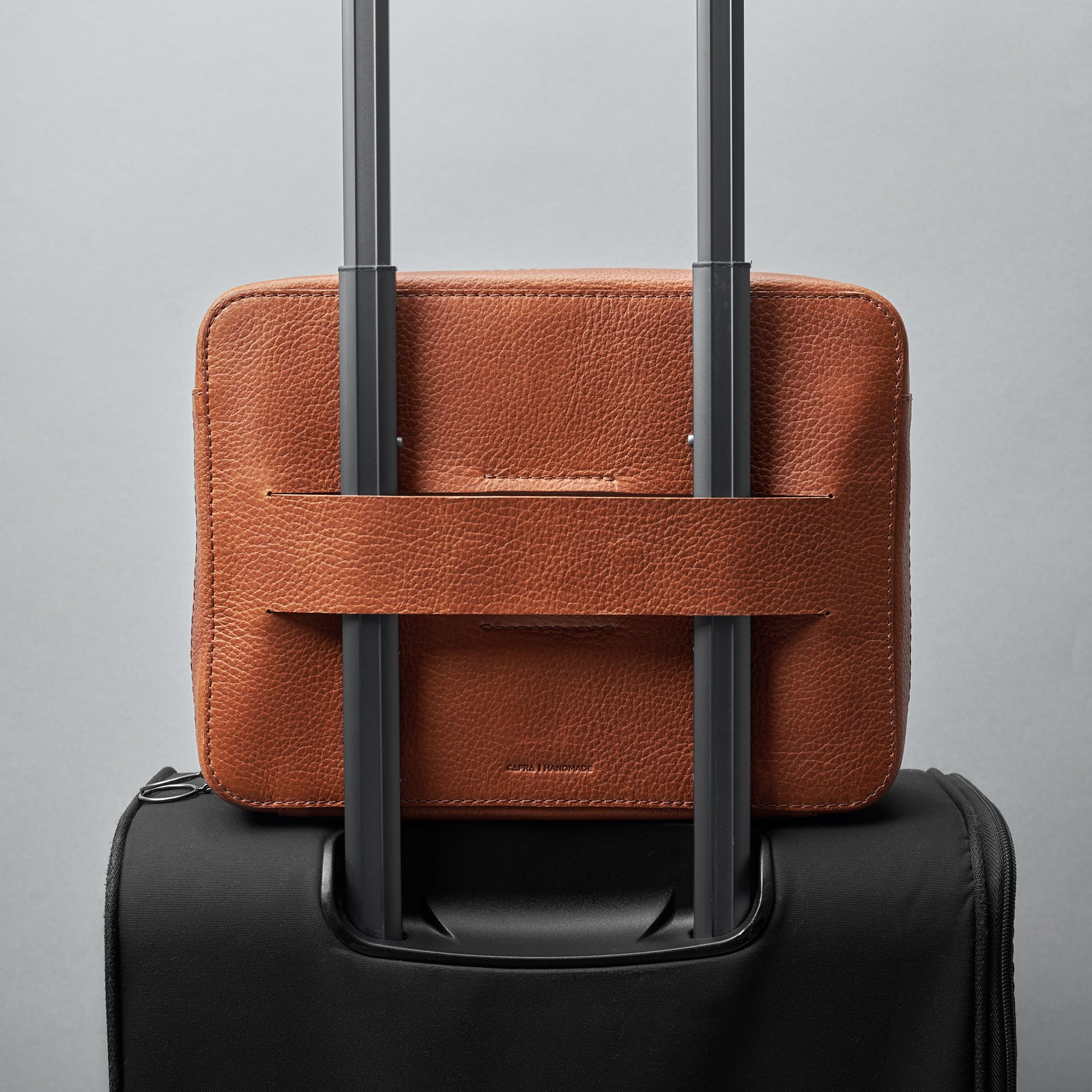 Optional invisible luggage strap. Tan tech organizer, EDC bag by Capra Leather