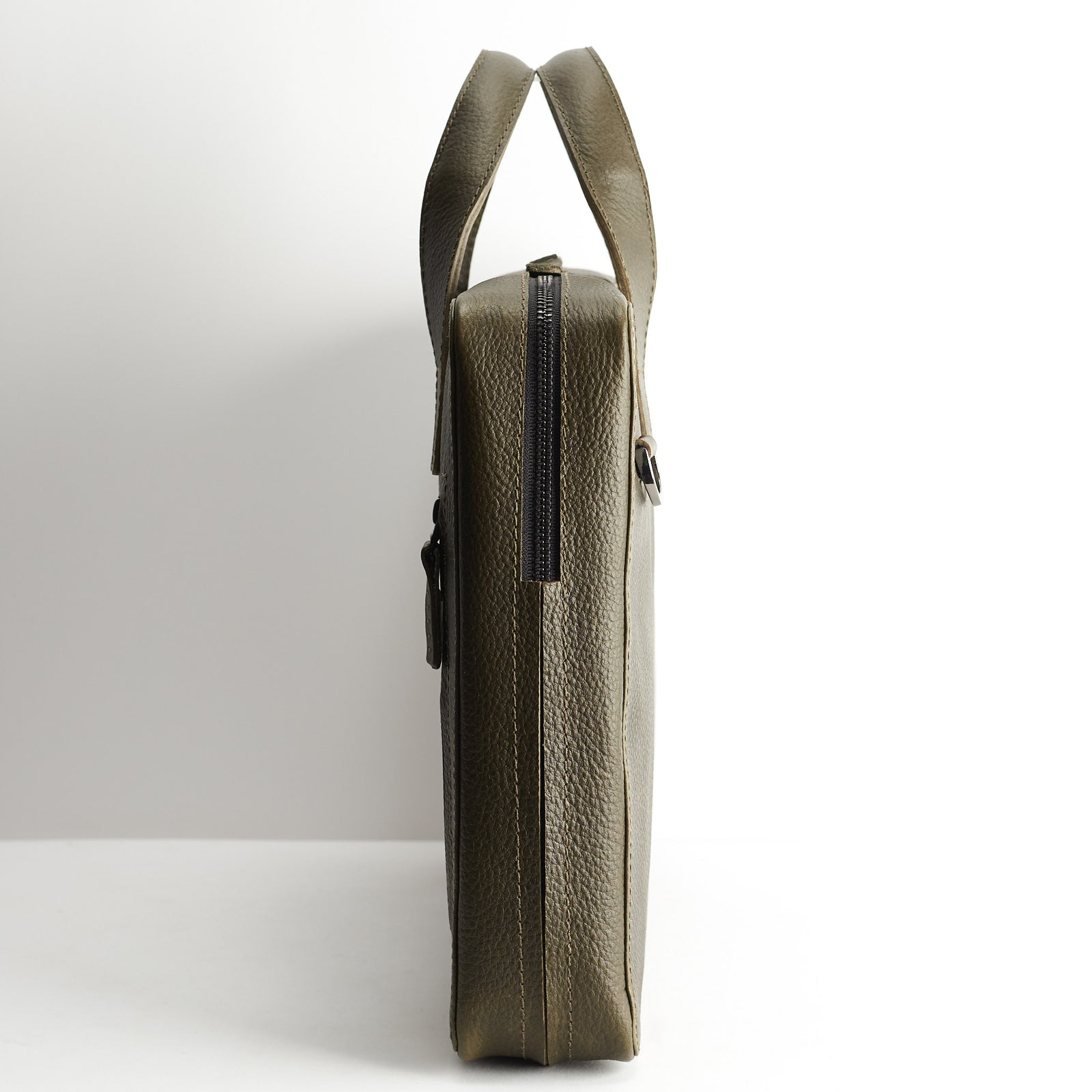 Slim profile. Greenleather briefcase for men. Office style mens workbag