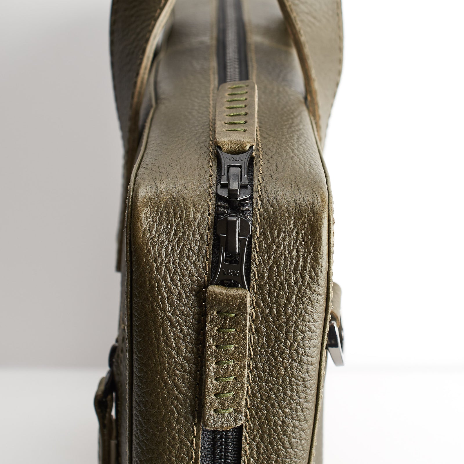 YKK Metallic zippers. Green leather briefcase for men. Office style mens workbag