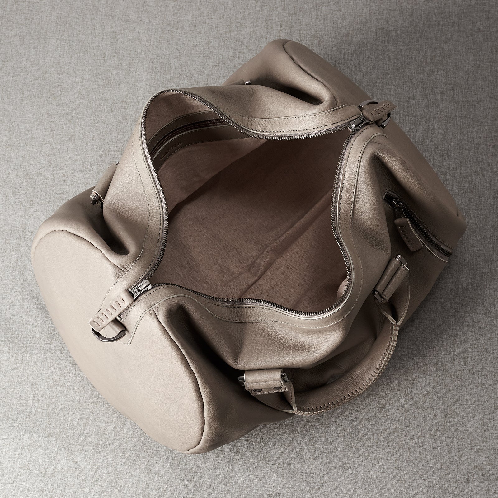 Inside. handcrafted Grey leather duffle bag for men. Grey leather carryall bag.