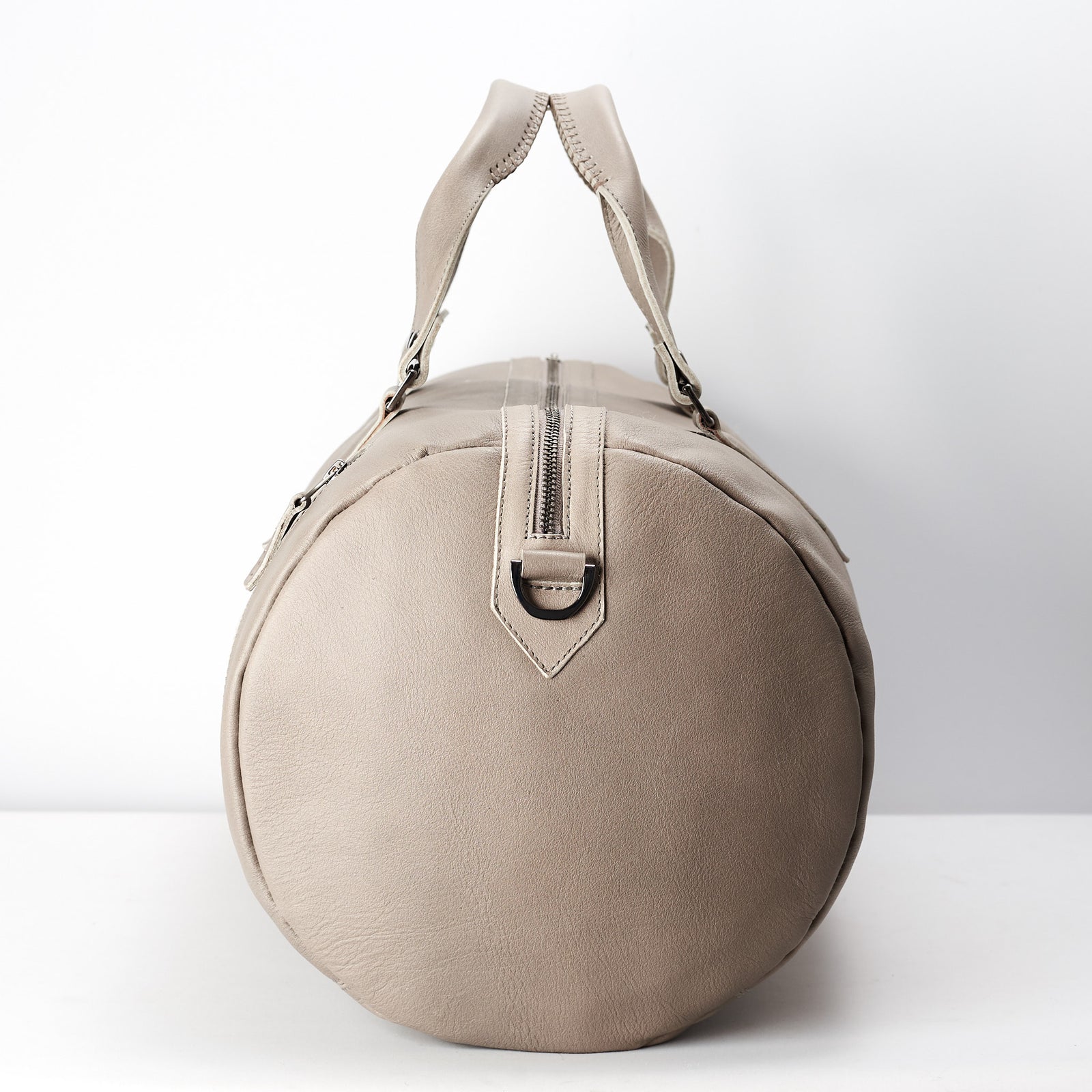 Barrel shape. handcrafted Grey leather duffle bag for men. Grey leather carryall bag.