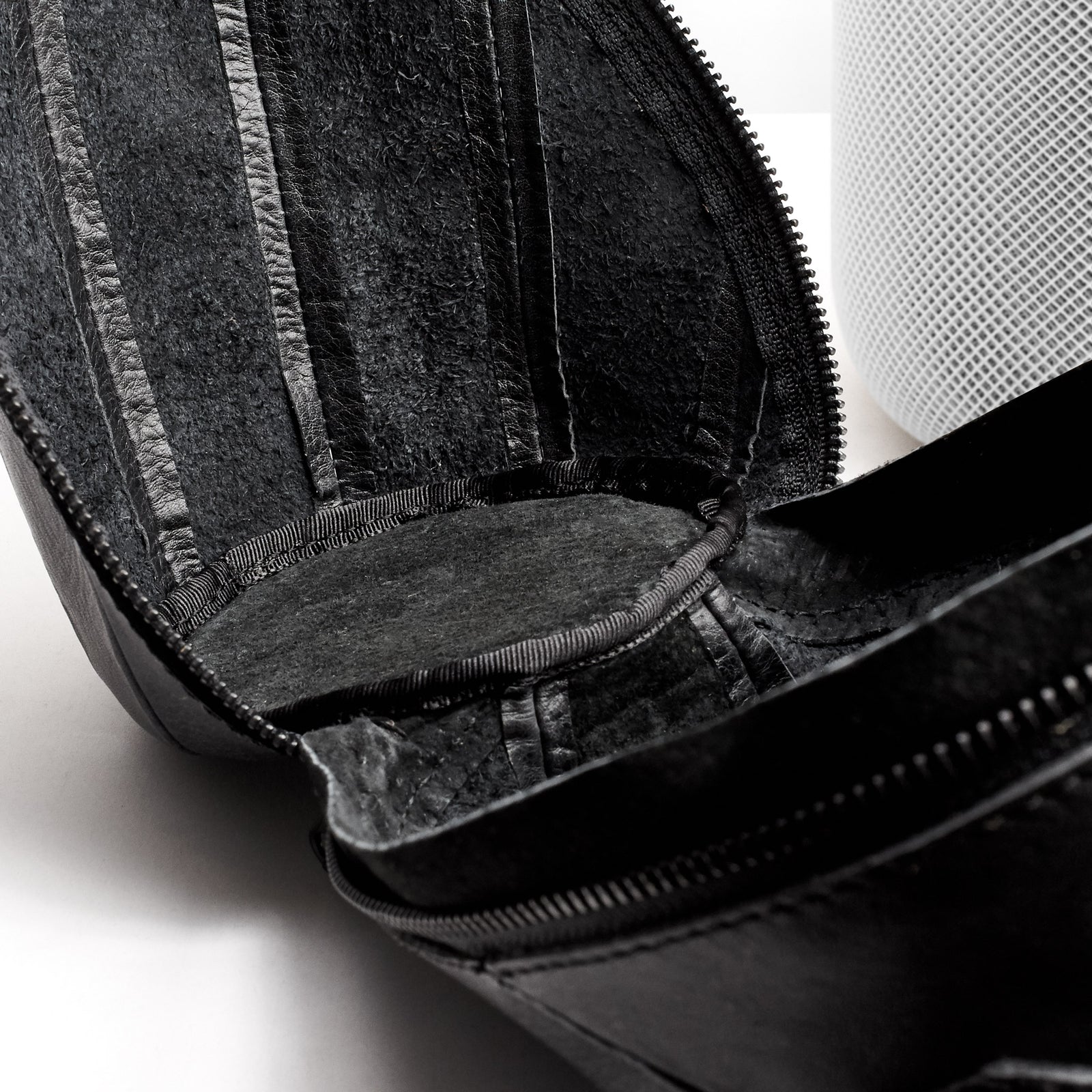 Soft leather interior and Padded Bottom. HomePod black leather travel carrying case.