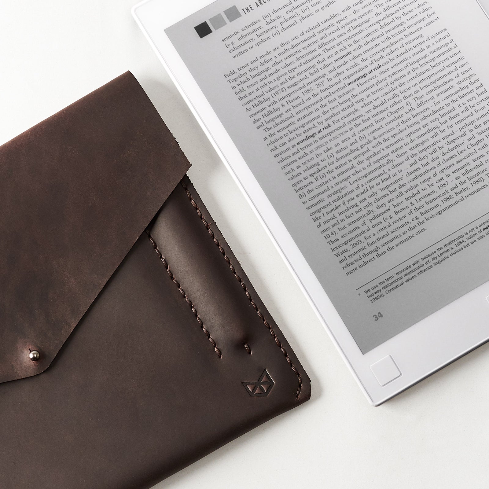 new reMarkable. Dark brown handcrafted leather reMarkable tablet case. Folio with Marker holder. Paper E-ink tablet minimalist sleeve design.
