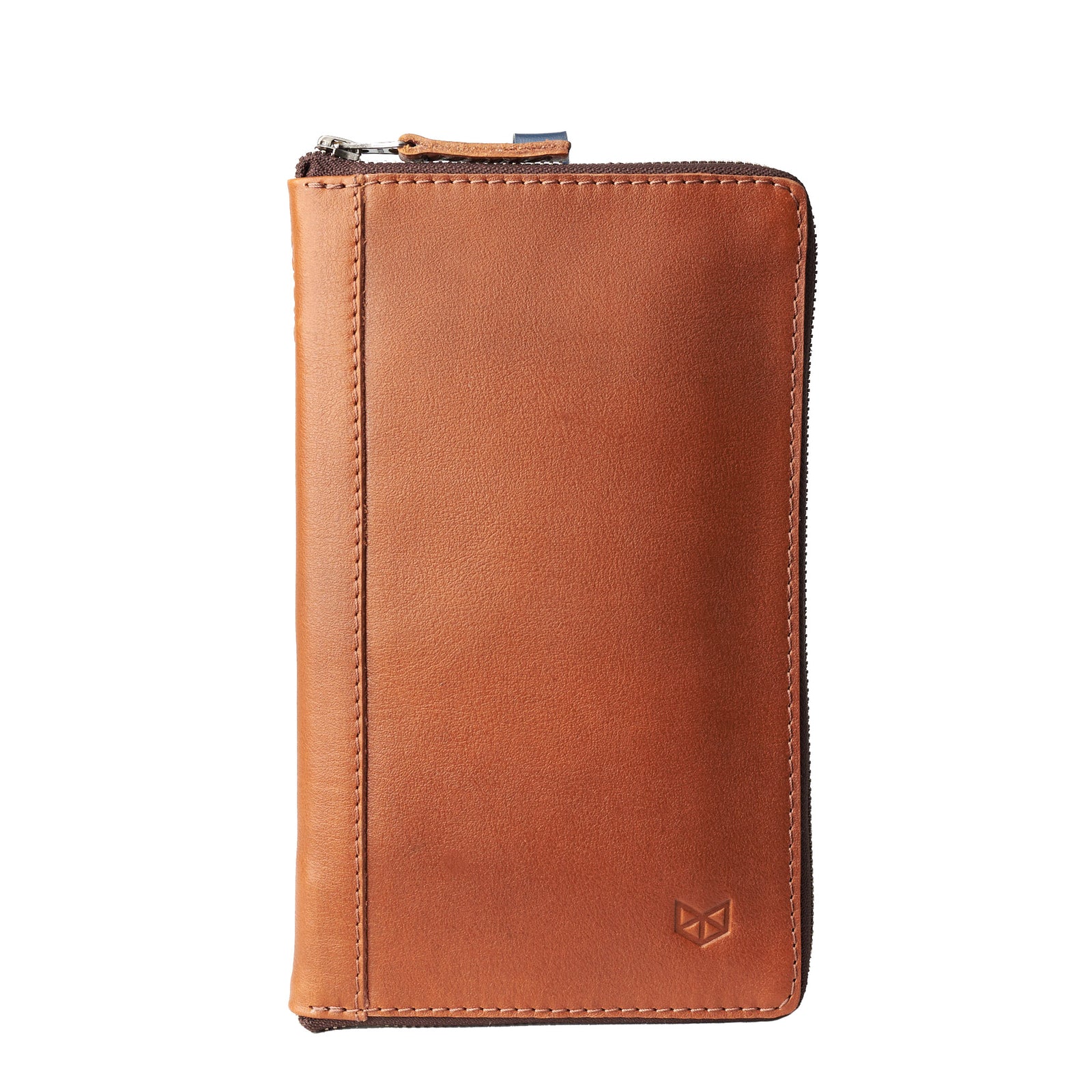 Front view. Tan leather passport holder. Airport travel leather organizer accessories. Leather good craft by Capra Leather.