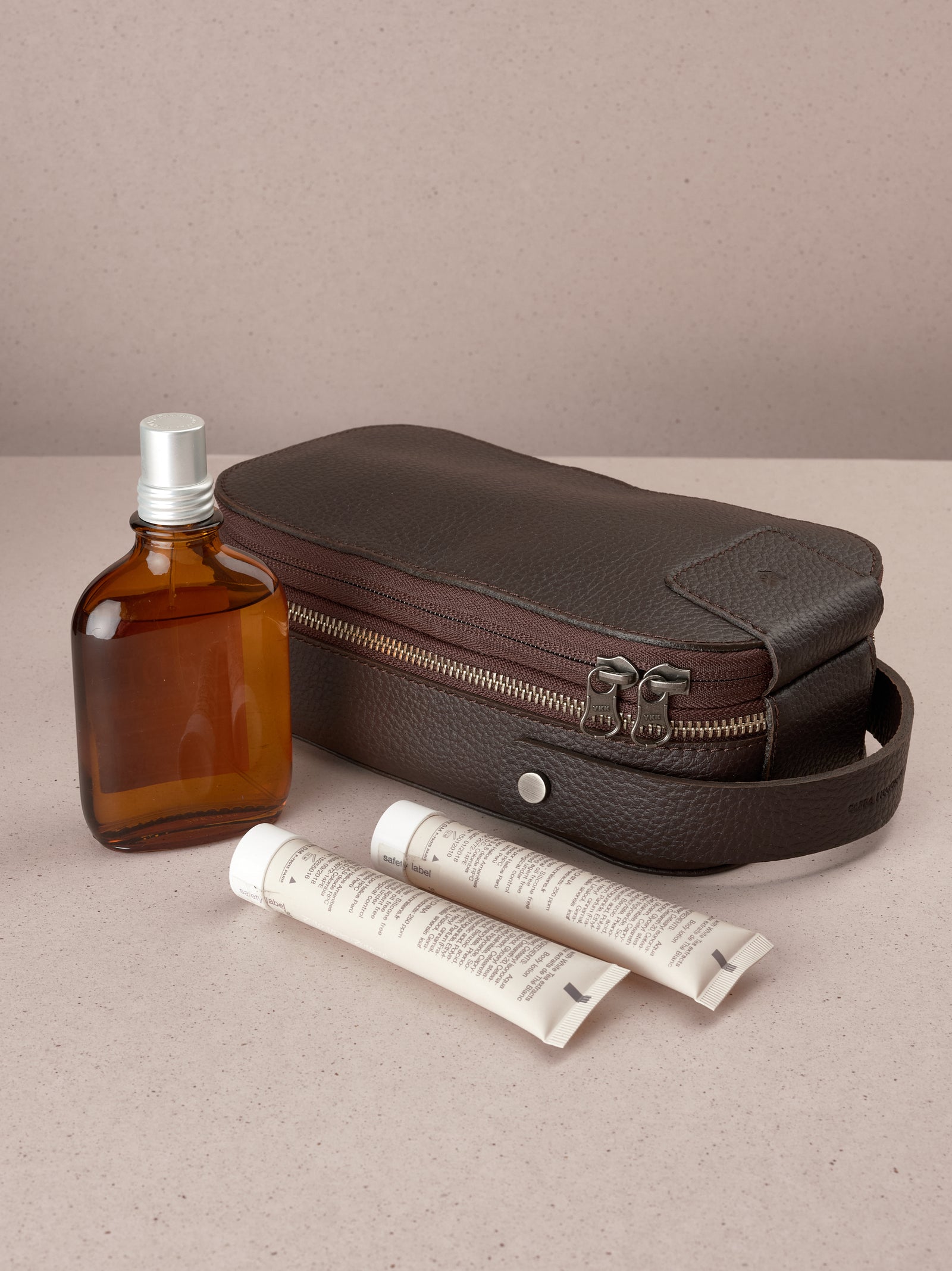 Leather toiletry bag dark brown by Capra