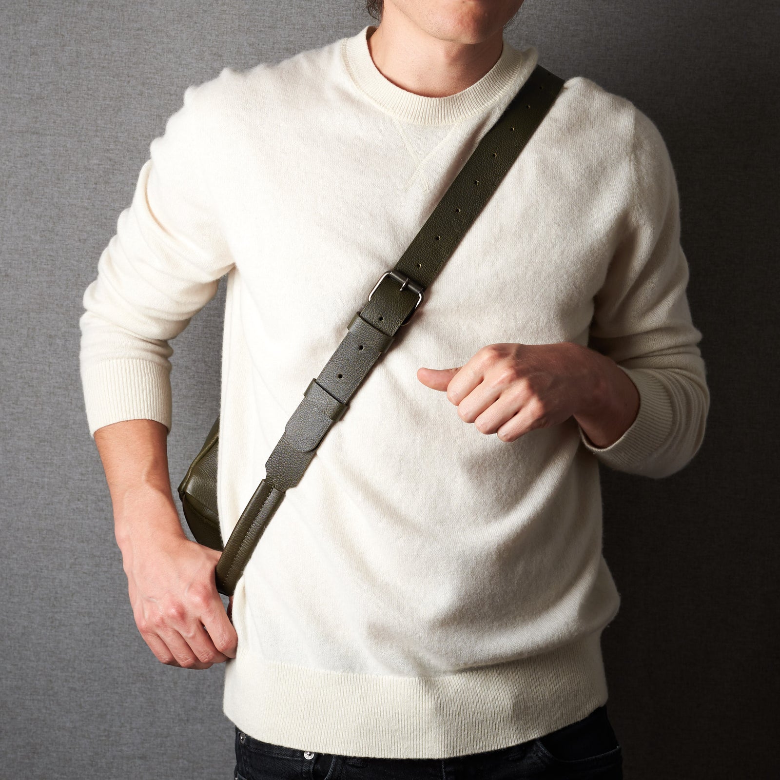 Styling shoulder strap. Fenek green sling bag for men by Capra Leather. Bicycle cyclist bag, everyday carry crossbody.