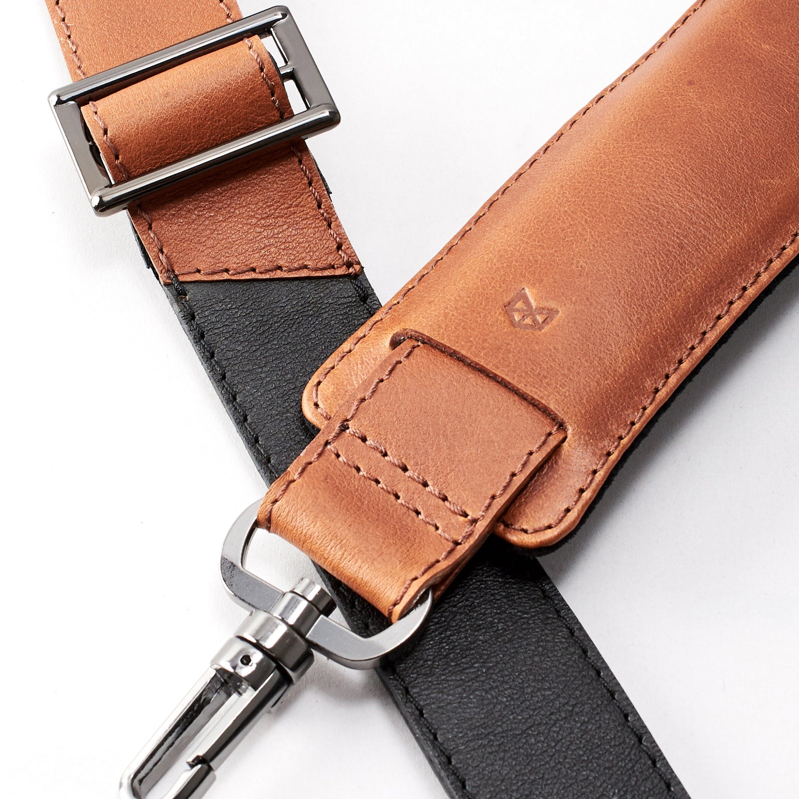 Shoulder strap. Double color men's duffle bag. Limited edition designer product. Unique weekender for travel.