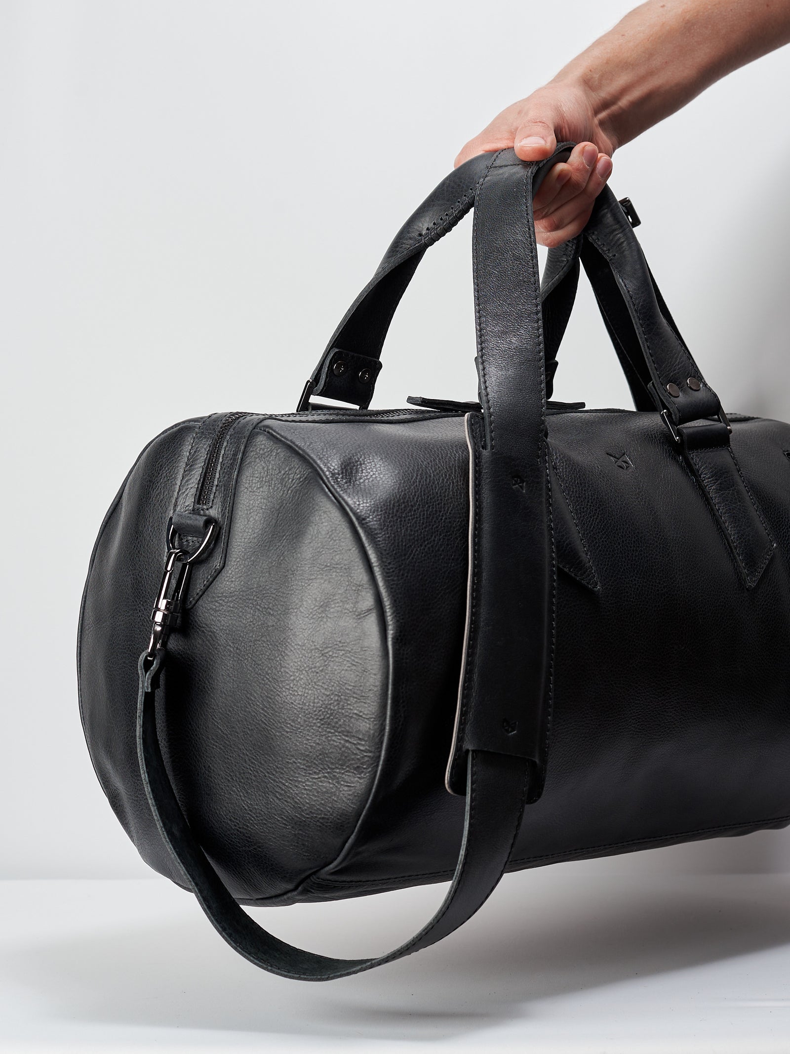 Side. Handmade black leather carry on cabin bag for men. Gifts for men