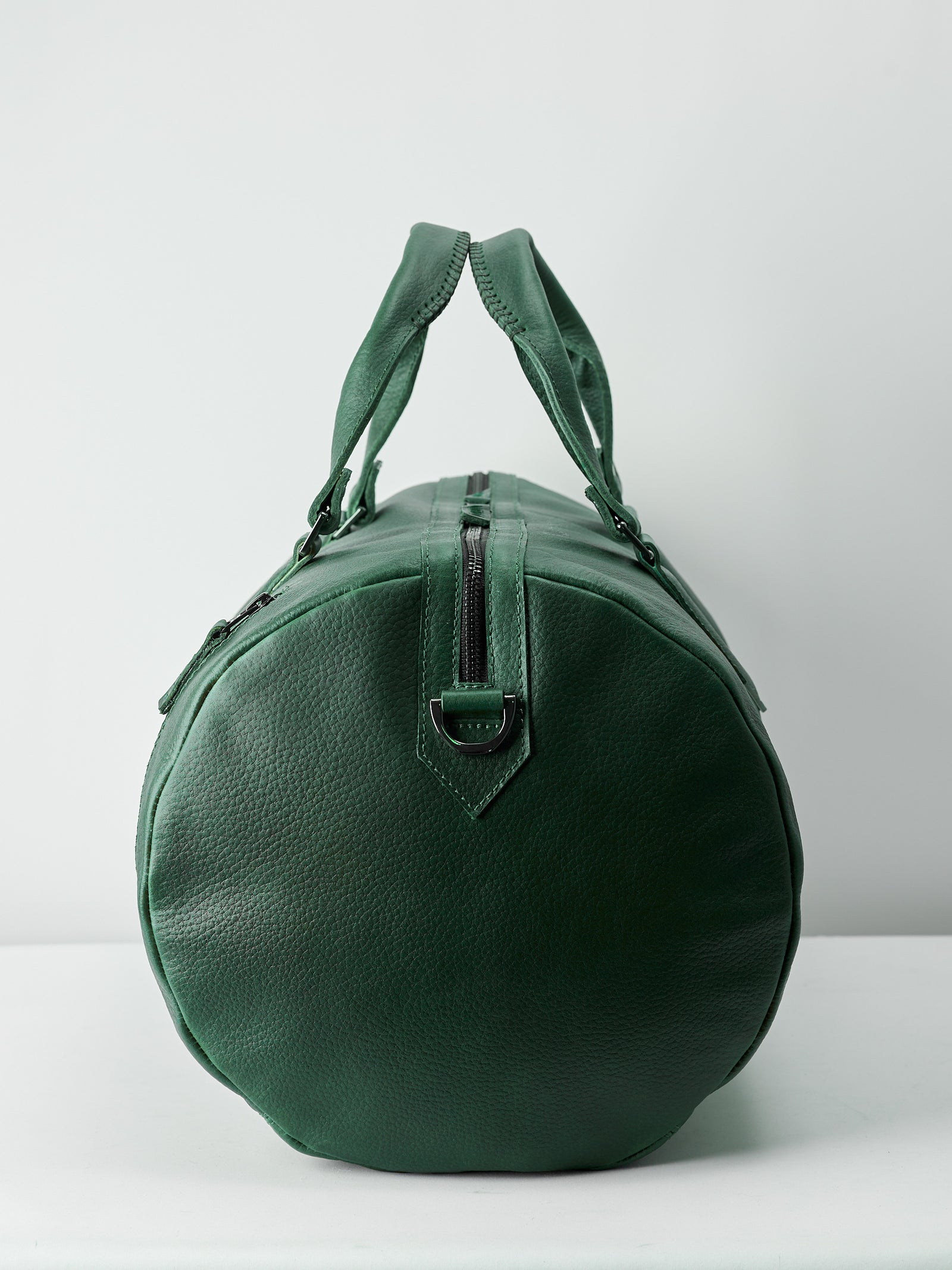 Angle. Handmade green leather holdall bag for mens gifts