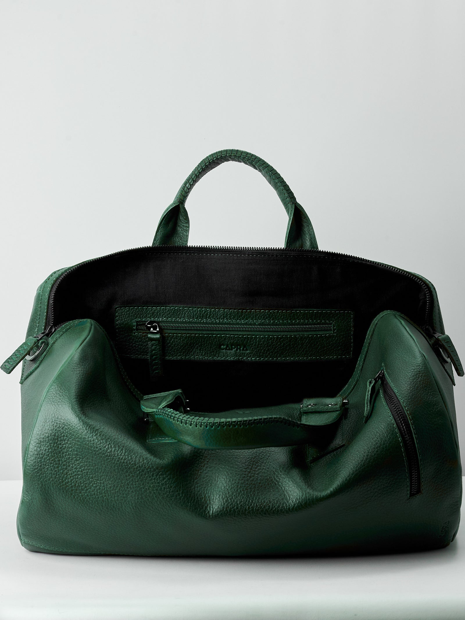 Linen interior. Green leather work out bag for men. Designer weekender travel bag
