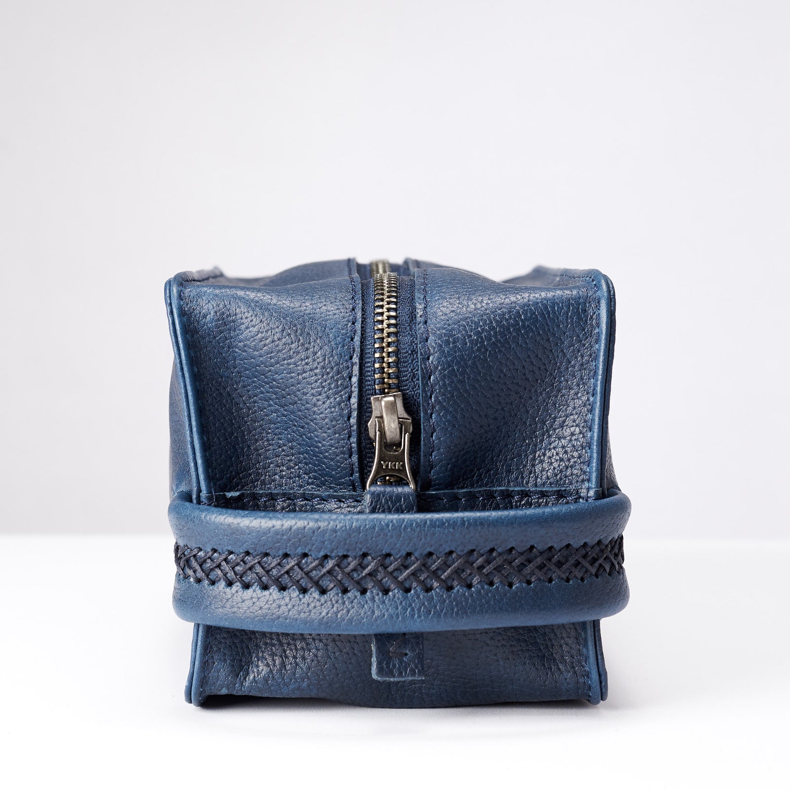 Handler. Ocean blue leather toiletry, shaving bag with hand stitched handle. Groomsmen gifts. Leather good crafted by Capra Leather