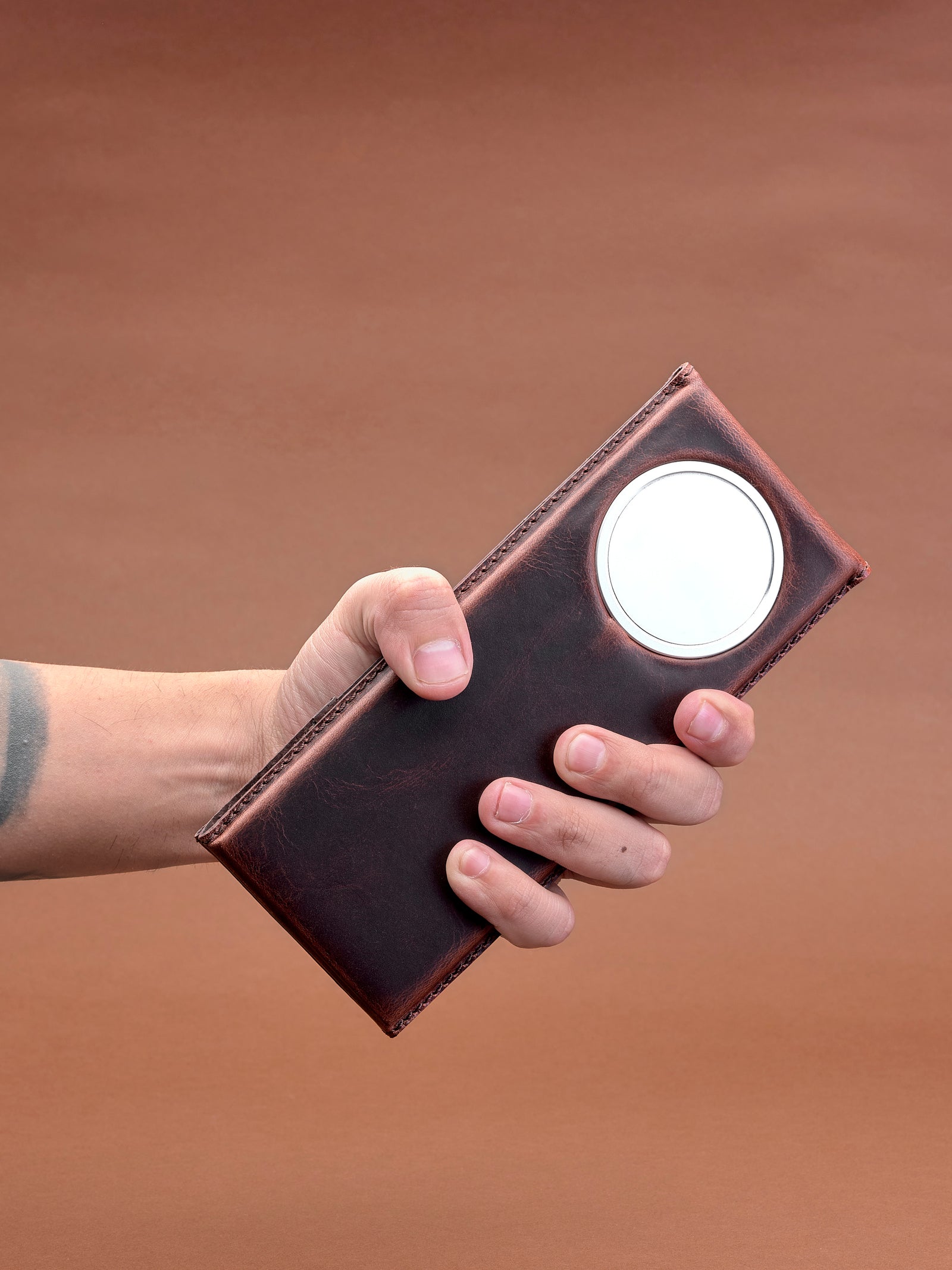 Charger station for iPhones with MagSafe. MagSafe iPhone Holder Stand Distressed Cognac by Capra Leather