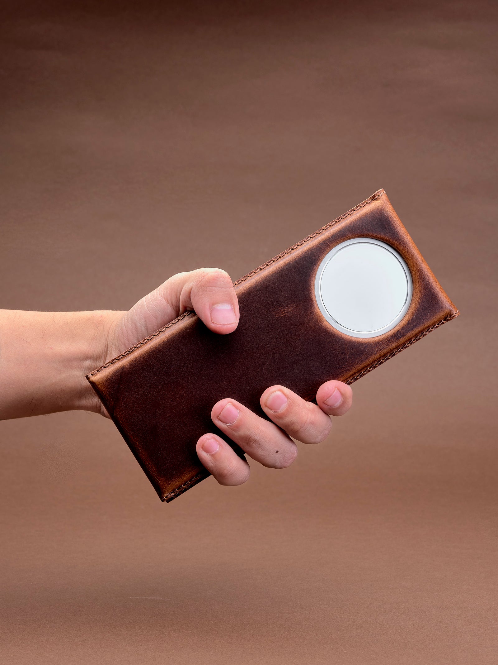 iPhone with MagSafe phone stand. MagSafe iPhone Holder Stand Distressed Tan by Capra Leather