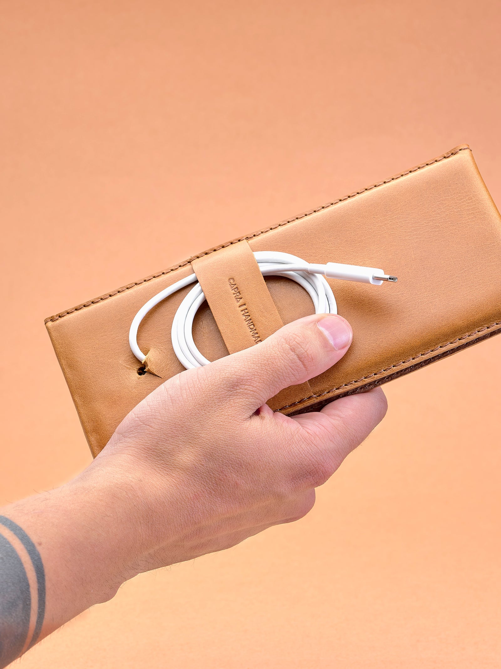 Cable management system. MagSafe iPhone Holder Stand Tan by Capra Leather