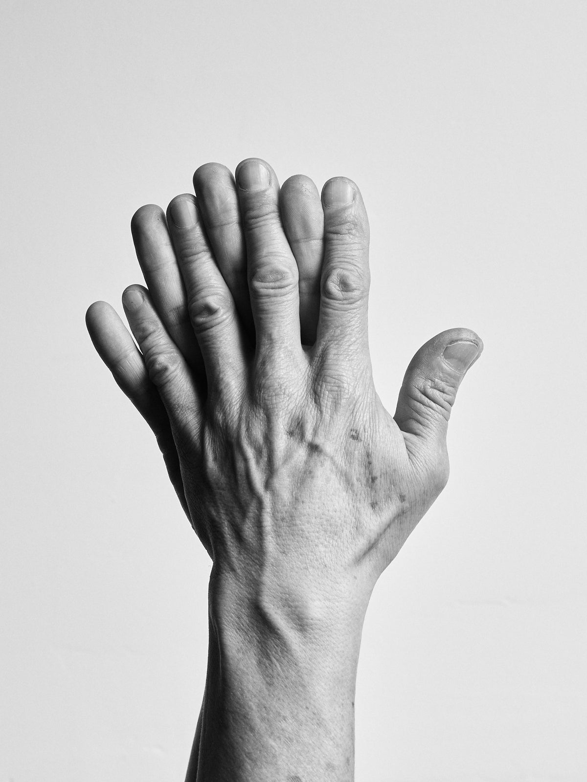 Hands of Javier Carlosama, Artisan at Capra Leather in Bogotá