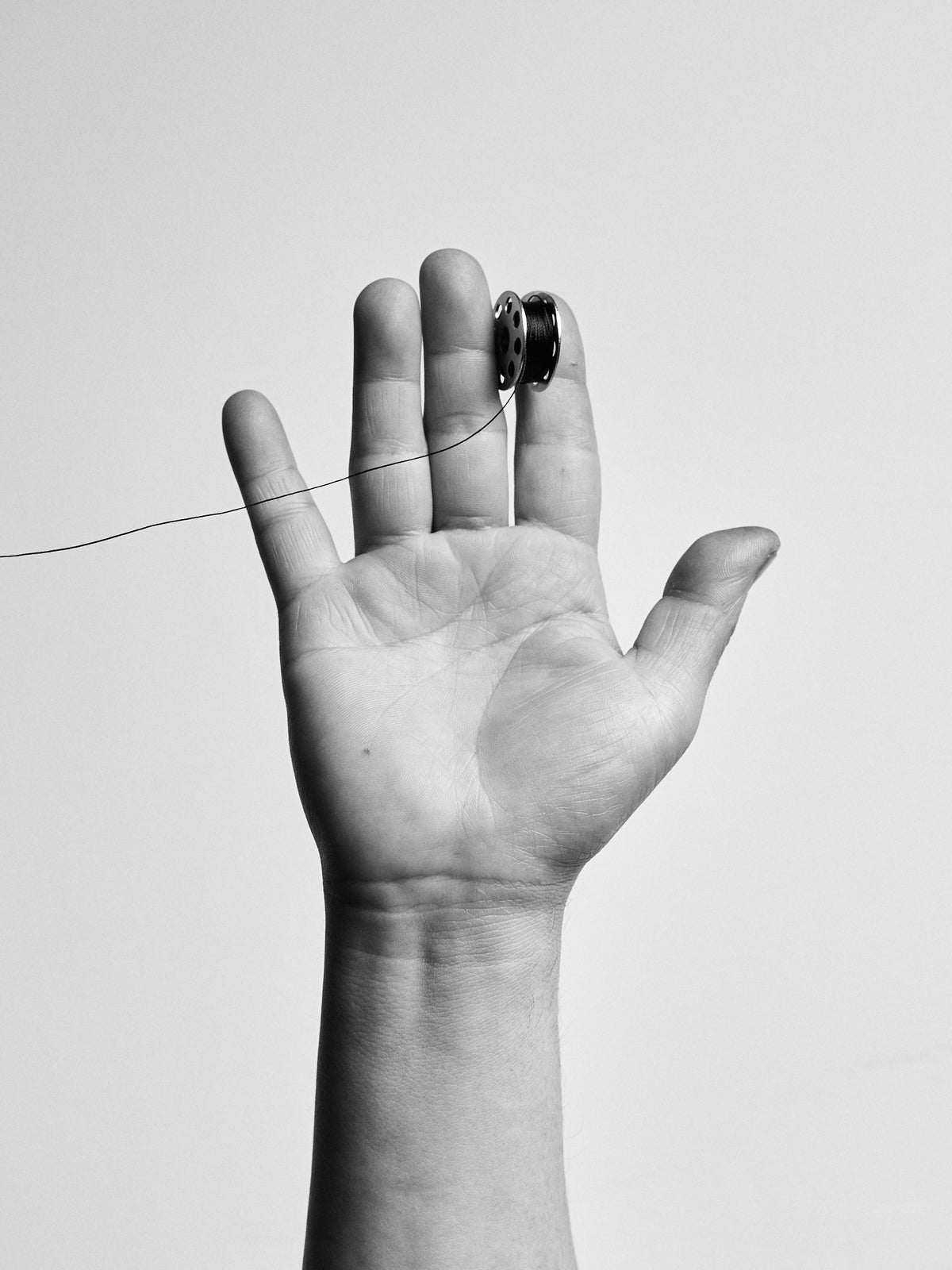 Hands of Jose Bravo, Artisan at Capra Leather in Bogotá