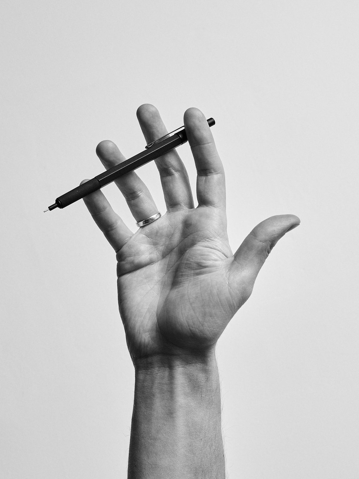 Hands of Juan A. Quiñones, Founder & Designer at Capra Leather in Bogotá