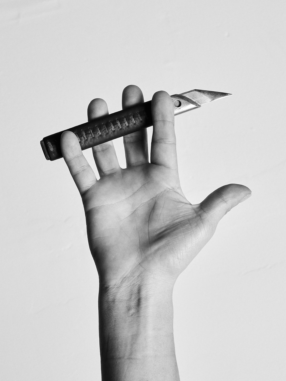 Hands of Libardo Pasaje, Artisan at Capra Leather in Bogotá