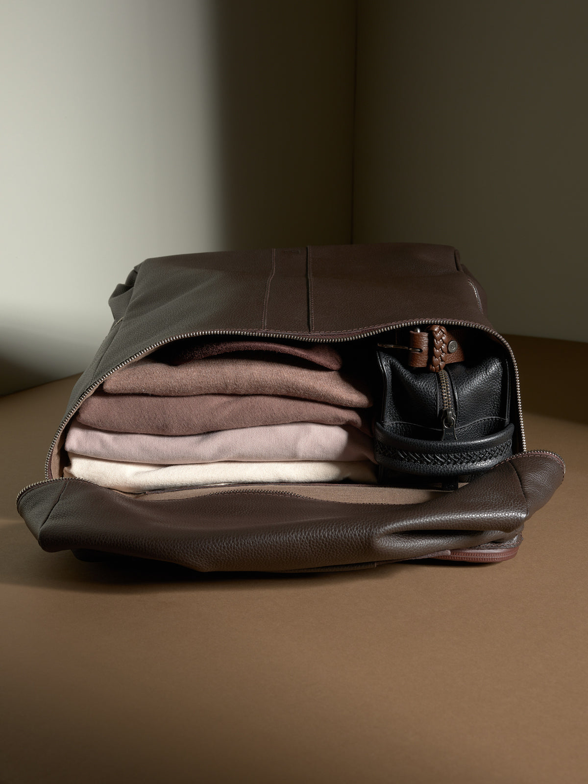 Capra Leather Banteng laid open flat, showing ample space for packing clothes and travel essentials.