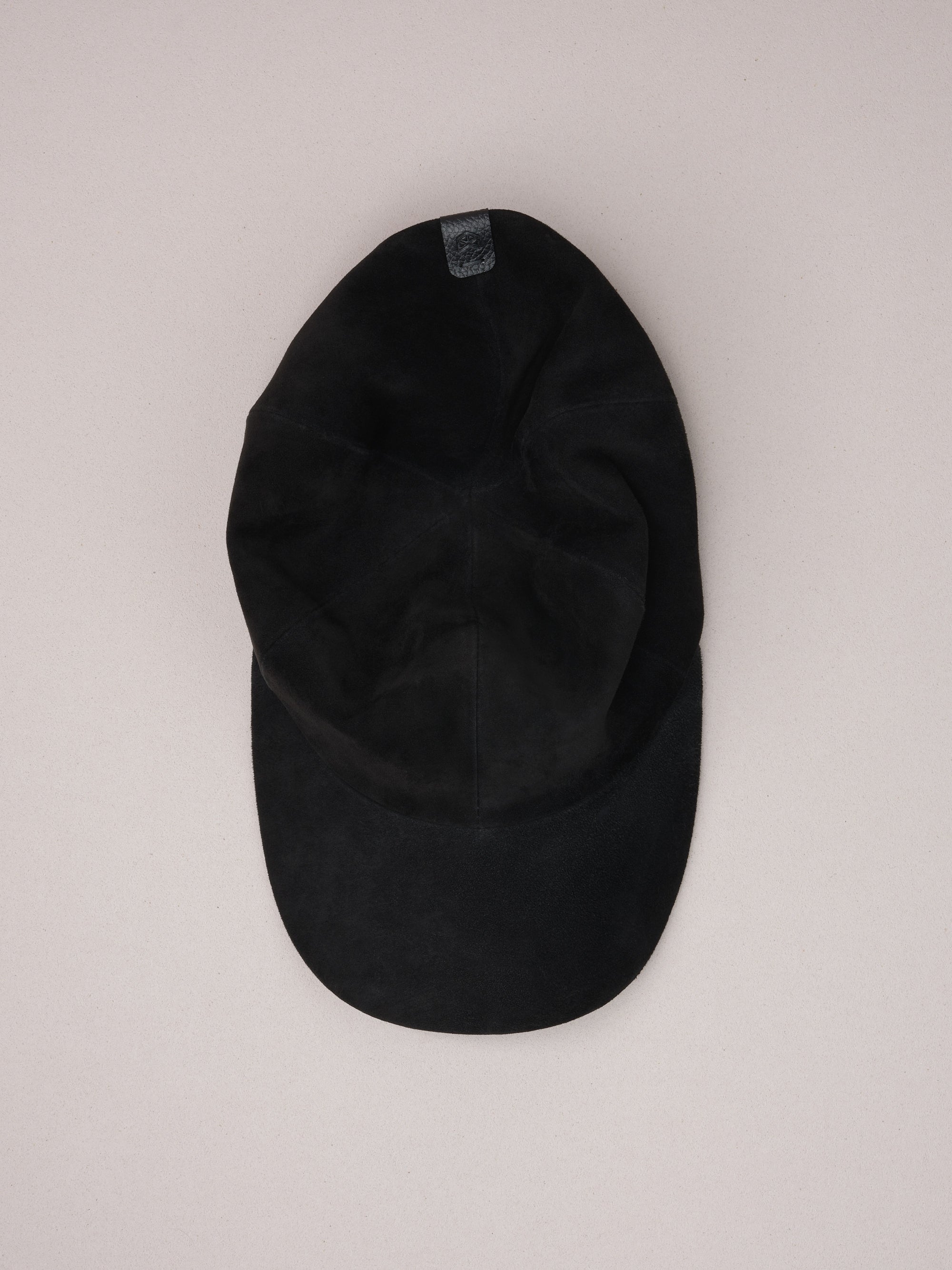 Handmade black suede baseball cap.