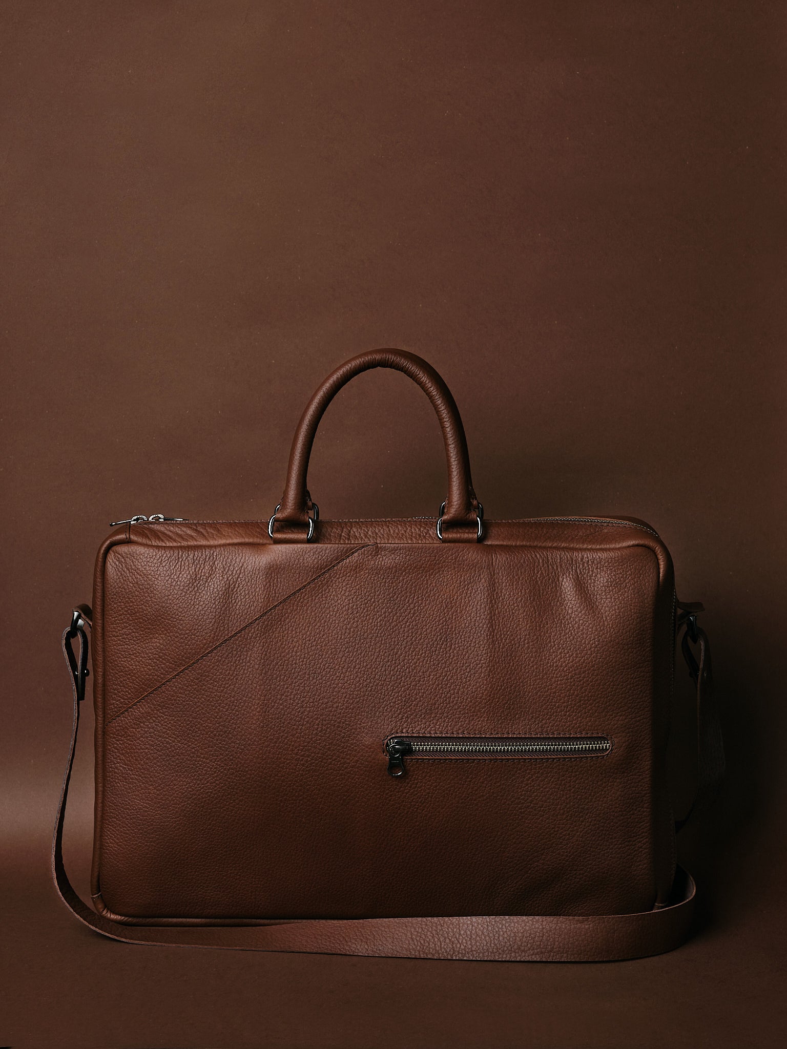 Front zip pocket. Best Convertible Briefcase Backpack Brown by Capra Leather