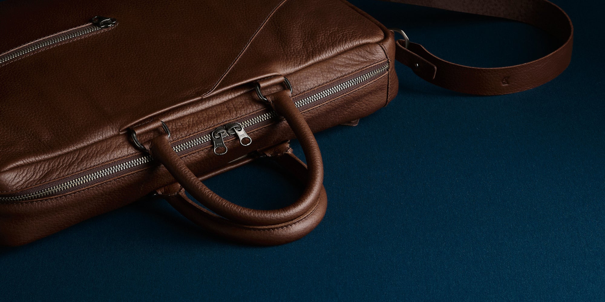 Hideaway haddles. Handmade Leather Briefcase Brown by Capra Leather