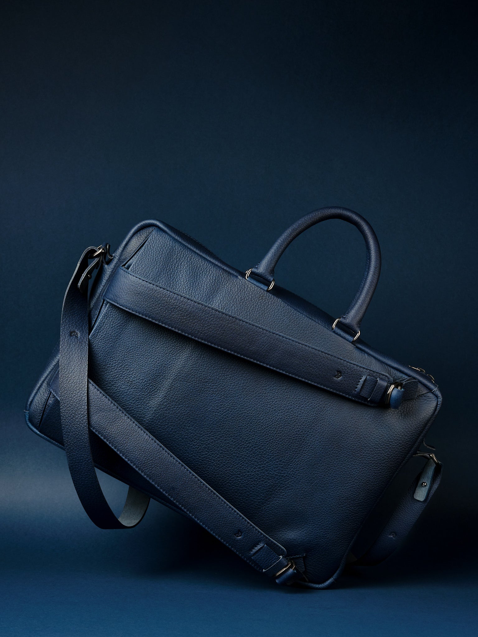Three-way carrying options. Briefcase Backpack Navy by Capra Leather