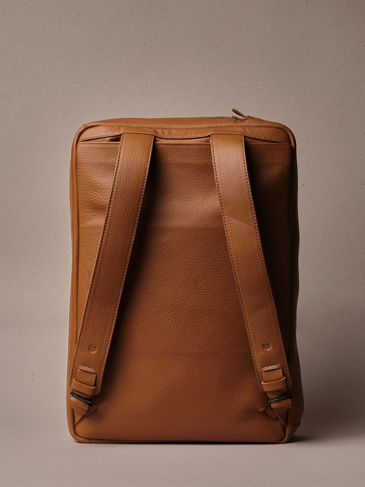 From Backpack to Briefcase. Tech Backpack Tan by Capra Leather