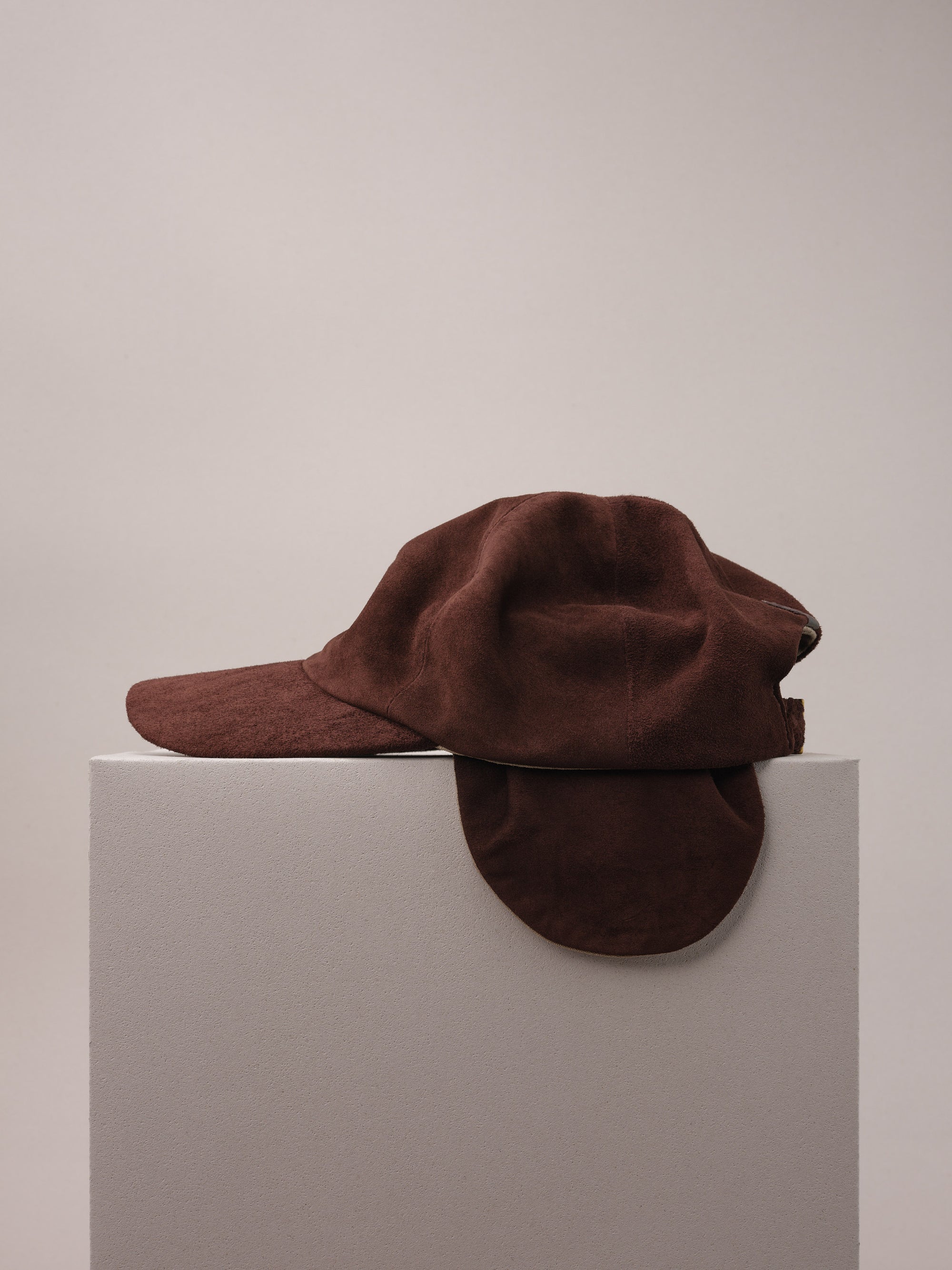 Brown Suede Cap with Removable Ear Flaps.