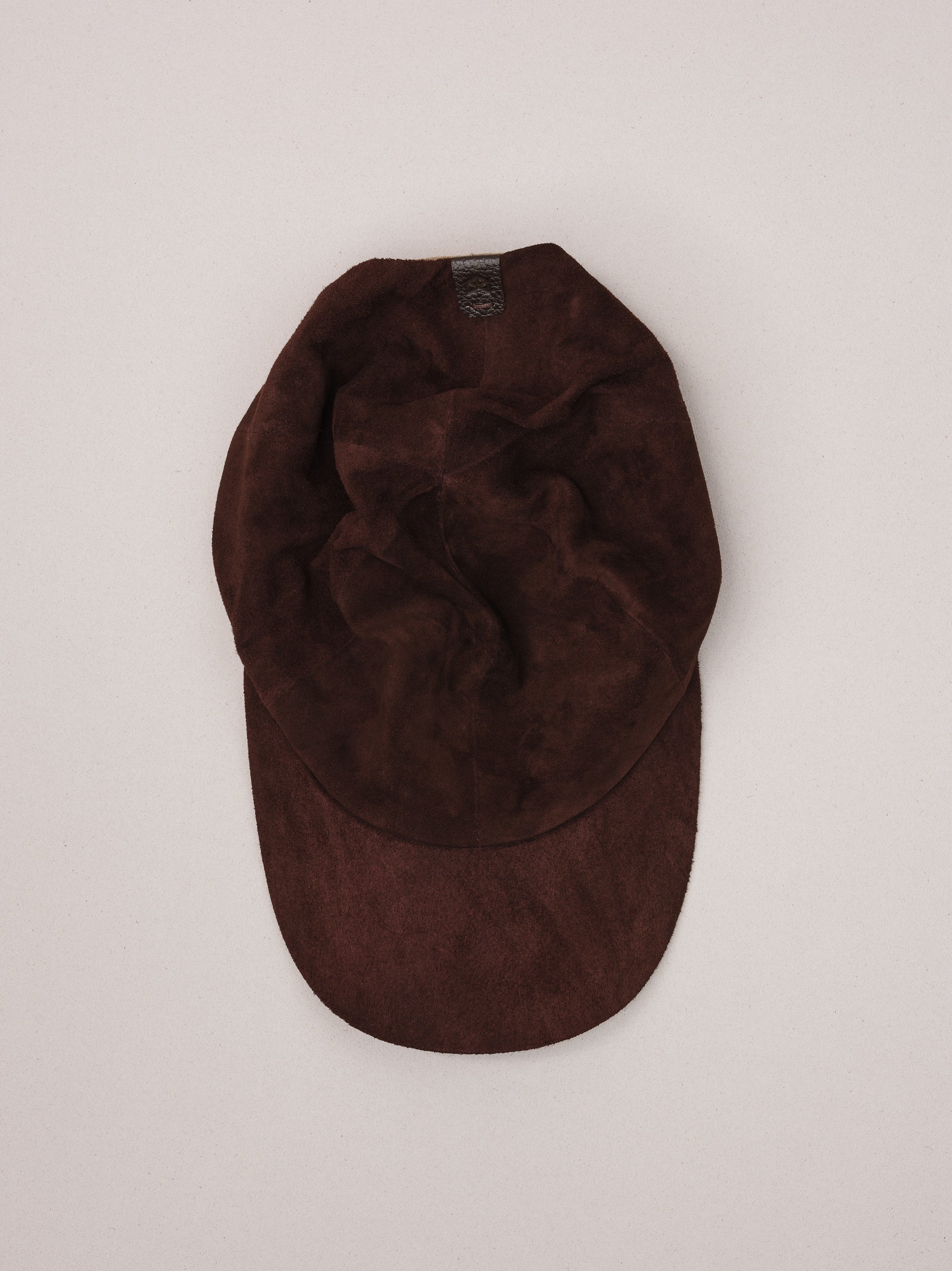 Handmade brown suede baseball cap.