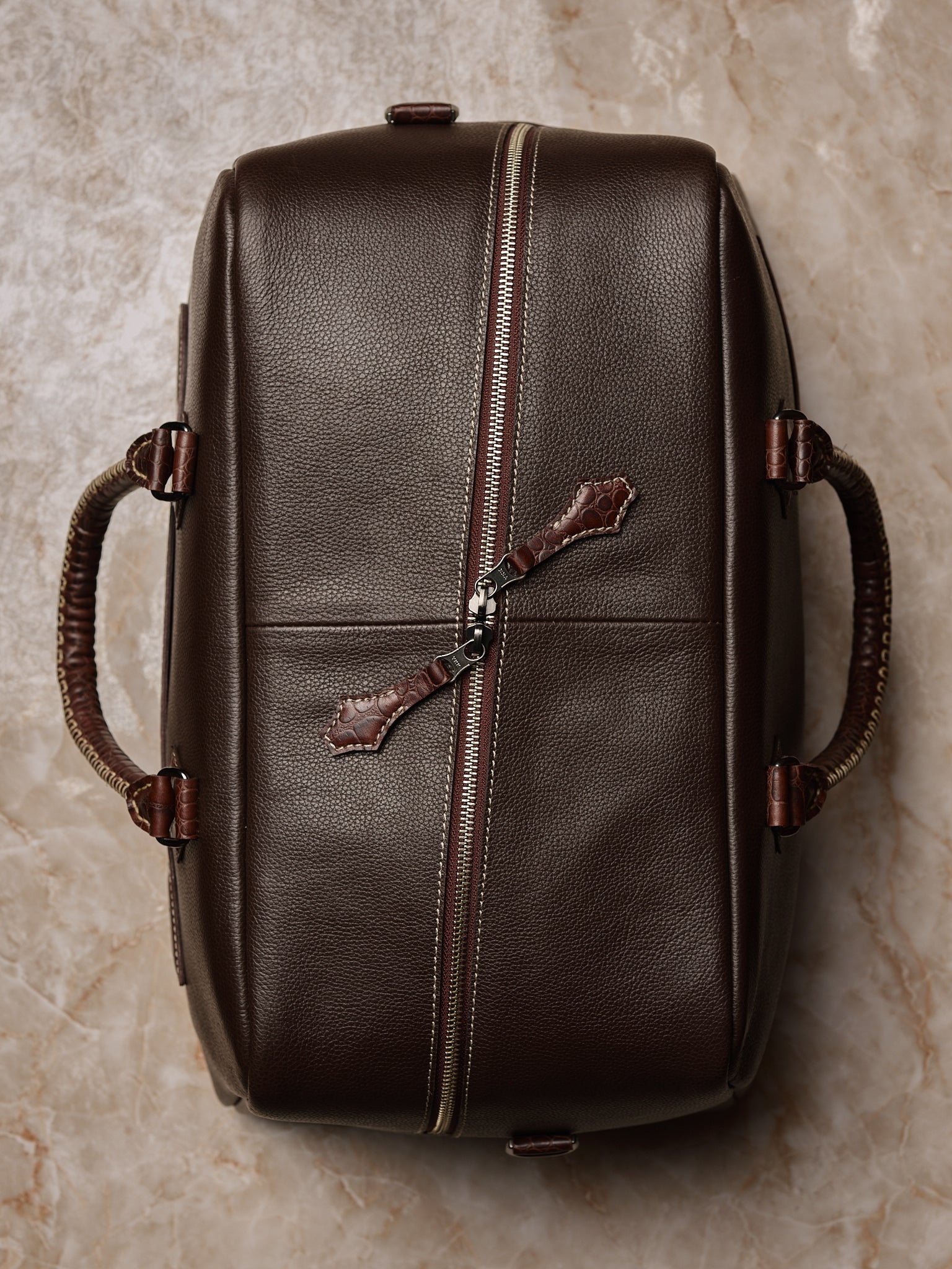 Hand-stitched handles. Duffle Bag Carry On Dark Brown by Capra Leather